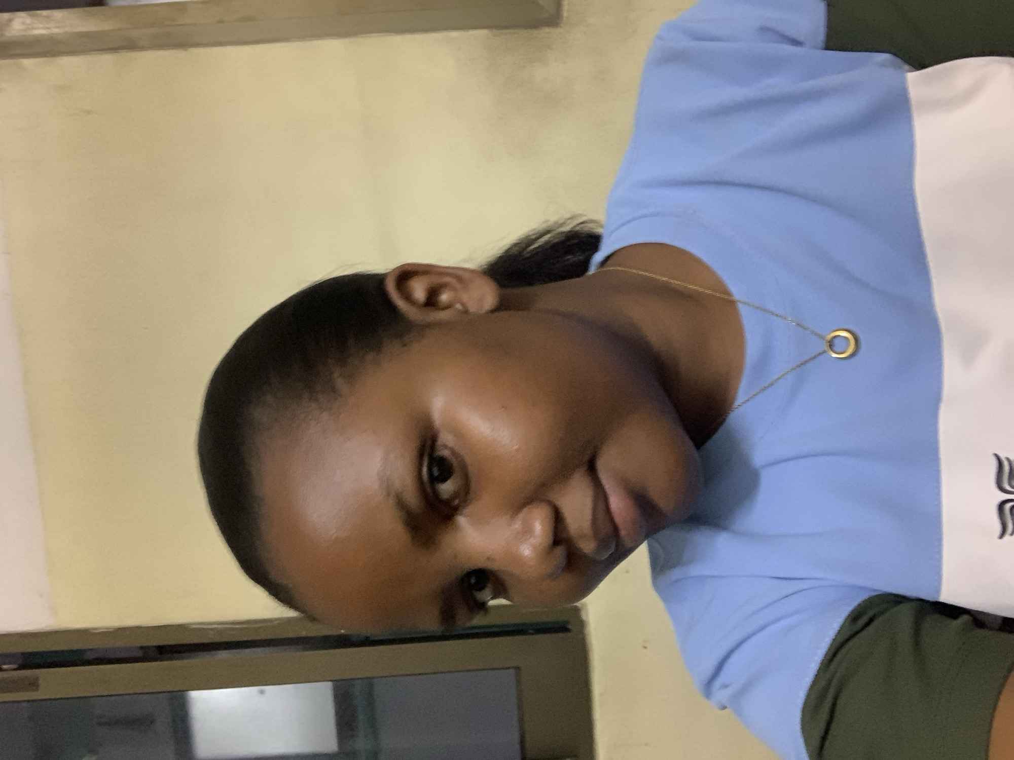 Woman photographed with smartphone photos in Dar es-Salaam