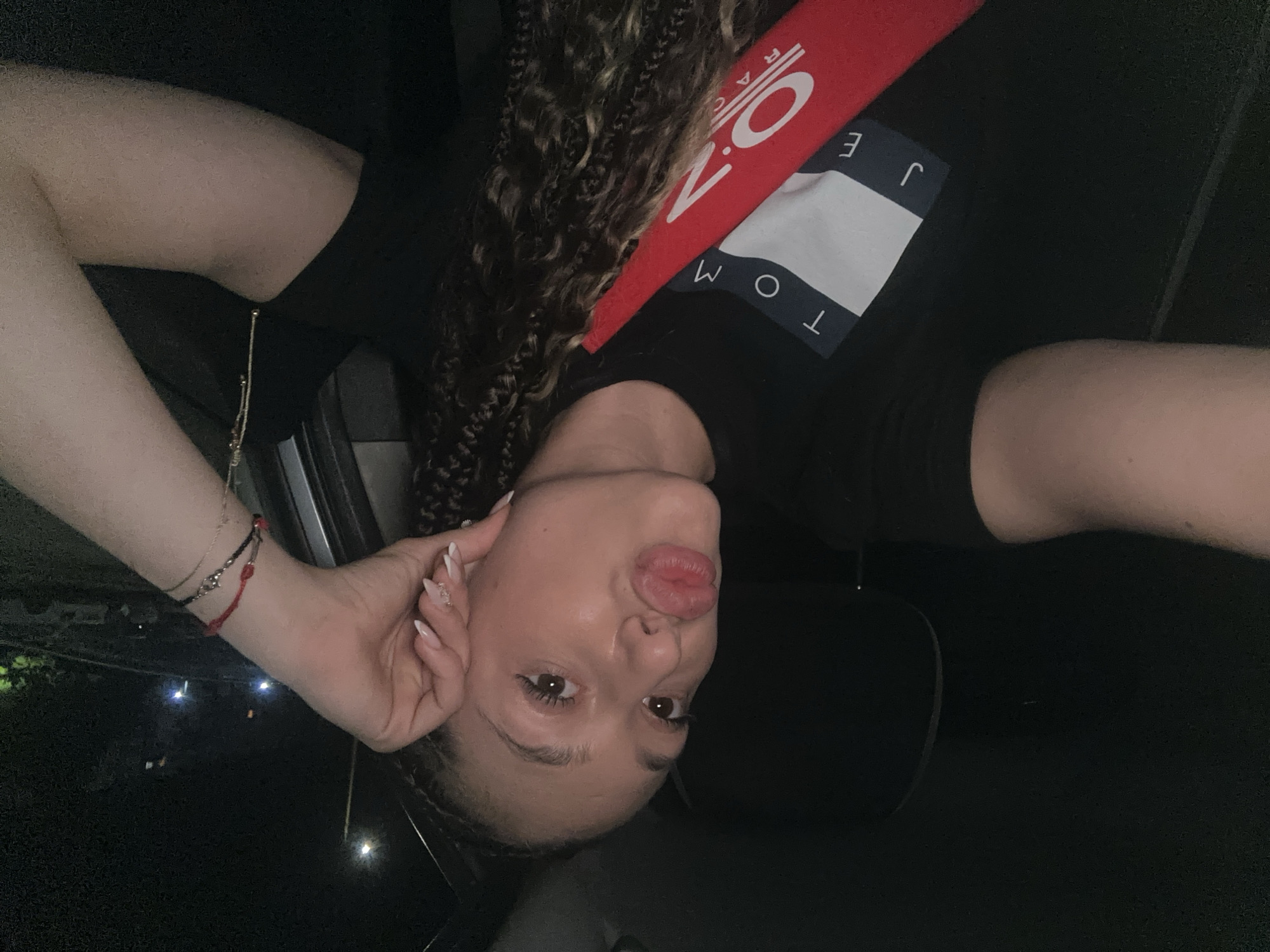 Young women take playful car selfies in Gabrovo Bulgaria