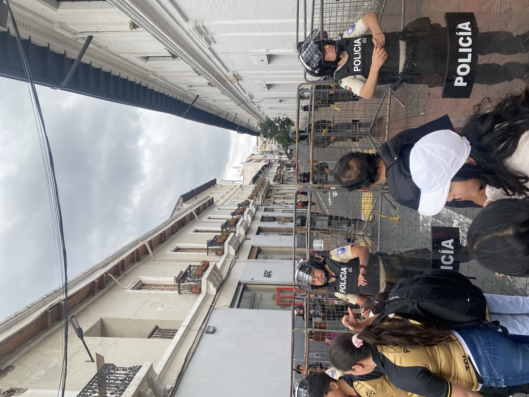 Police deploy as large crowds gather in Quito streets
