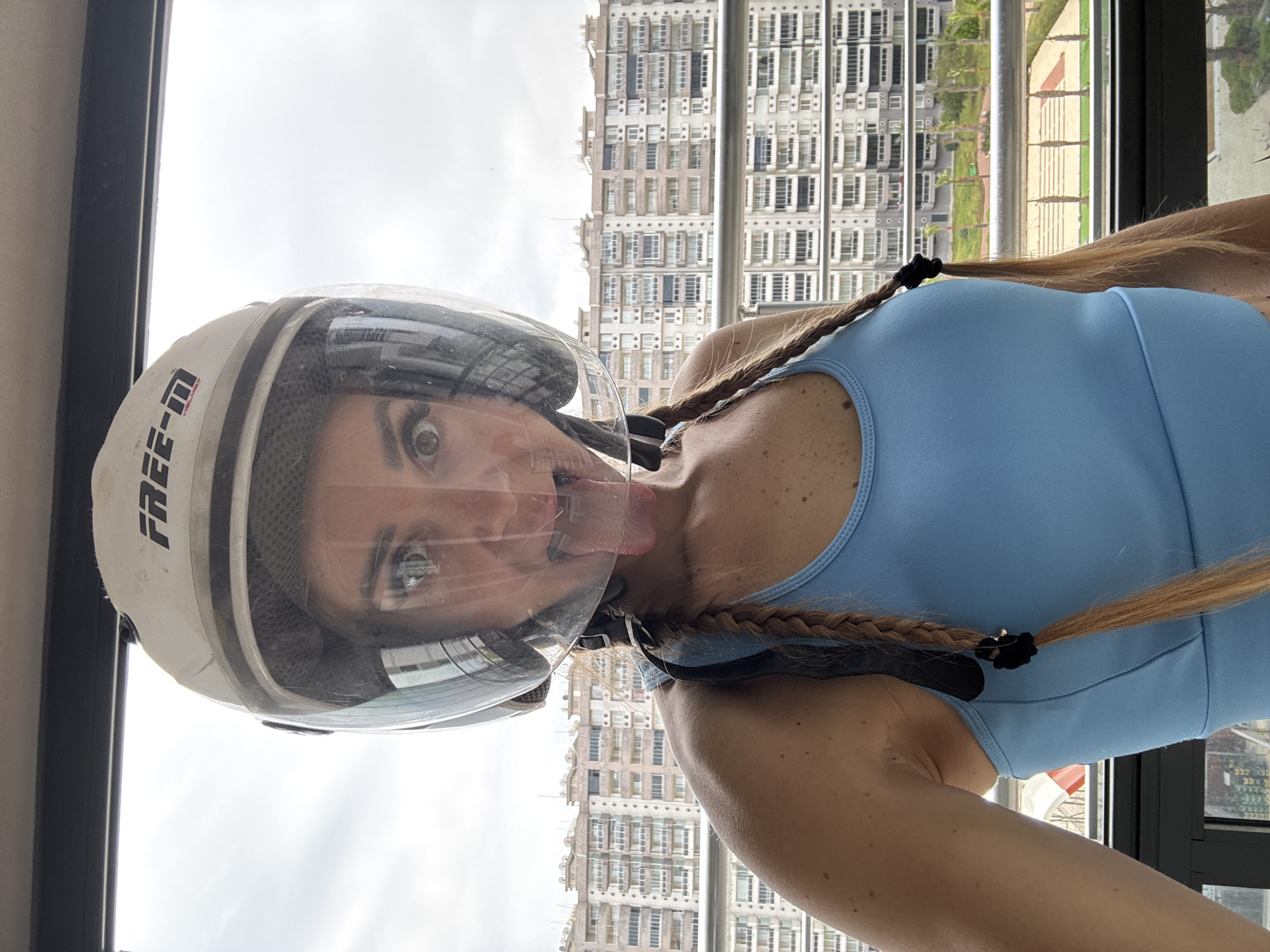 Woman documents helmet selfies and breakfast on Erdemli balcony