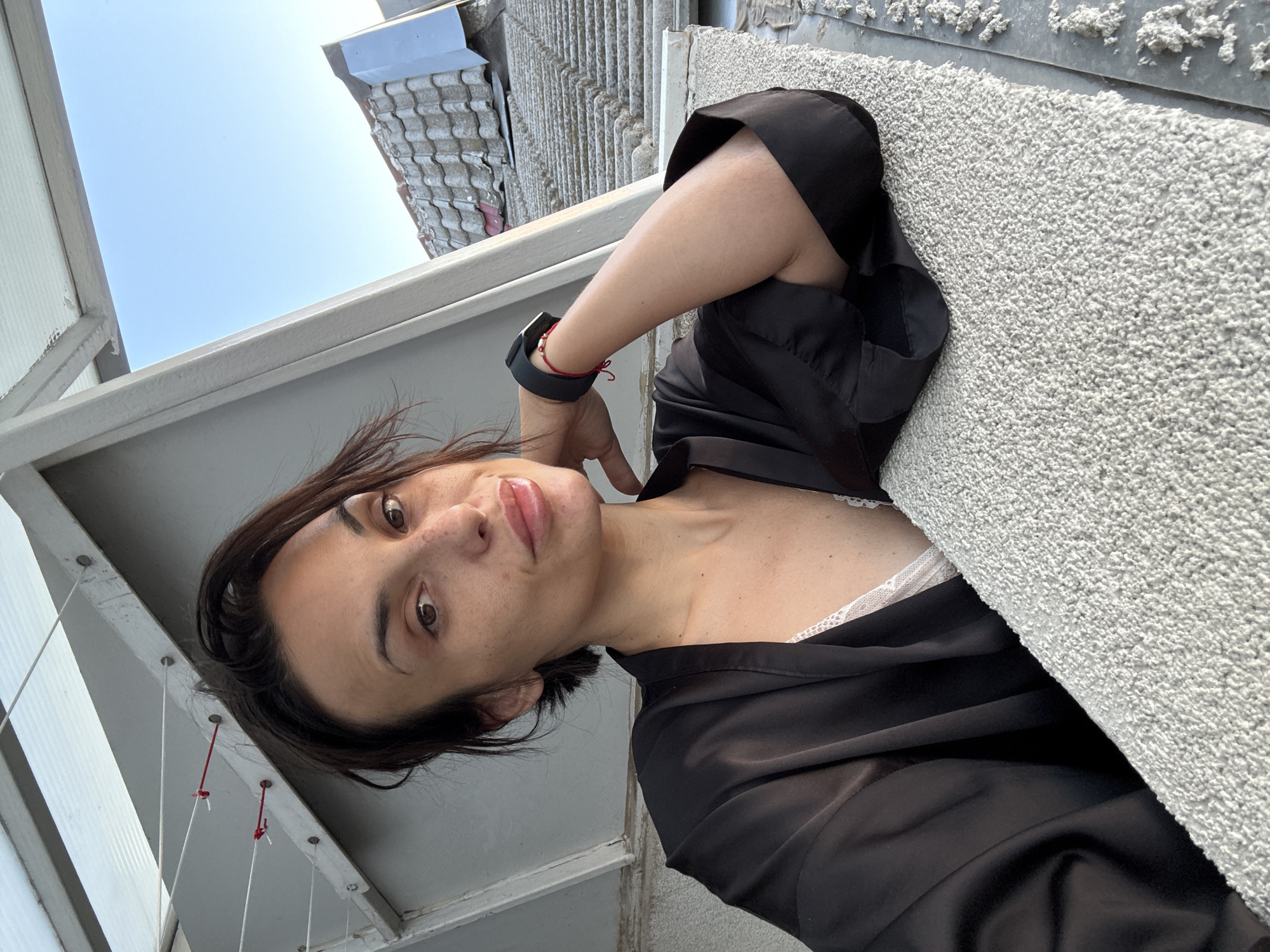 Morning selfie session in black robe across Pleven apartment