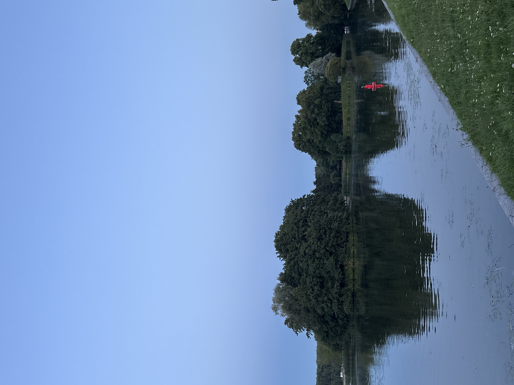 Lakeside city evening: water, architecture, and streets at dusk