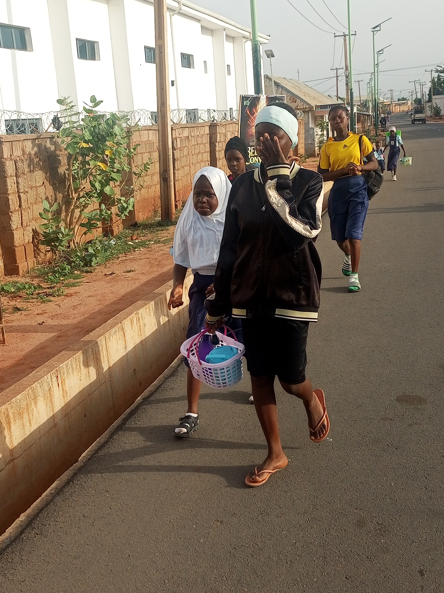 Morning pedestrian activity observed in urban area near school