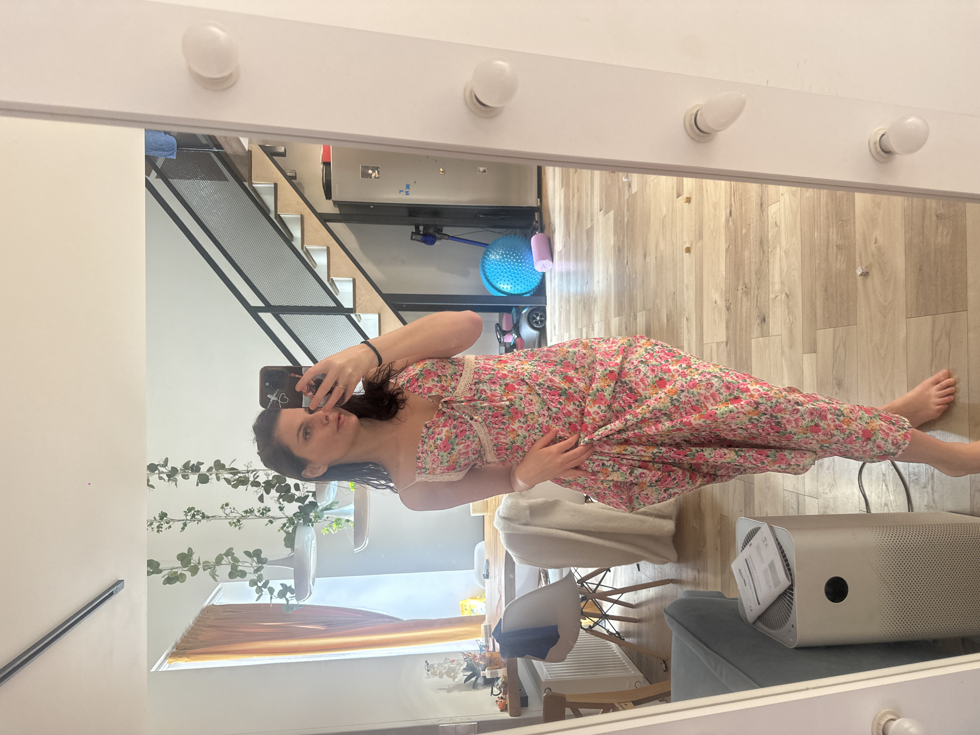 Floral dress selfies, a roaming cat, and quiet indoor moments