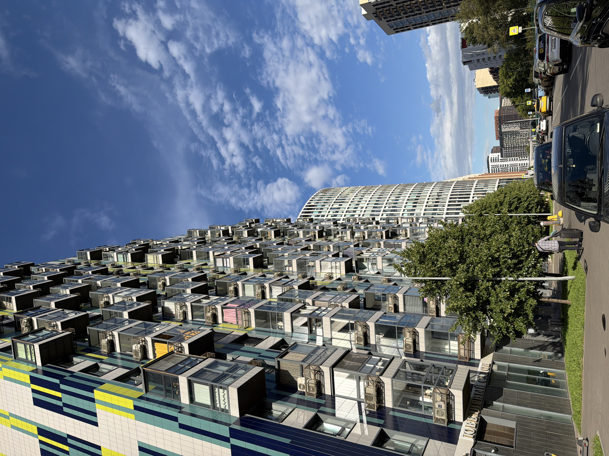 Moscow residential tower with glass-enclosed balconies and AC units