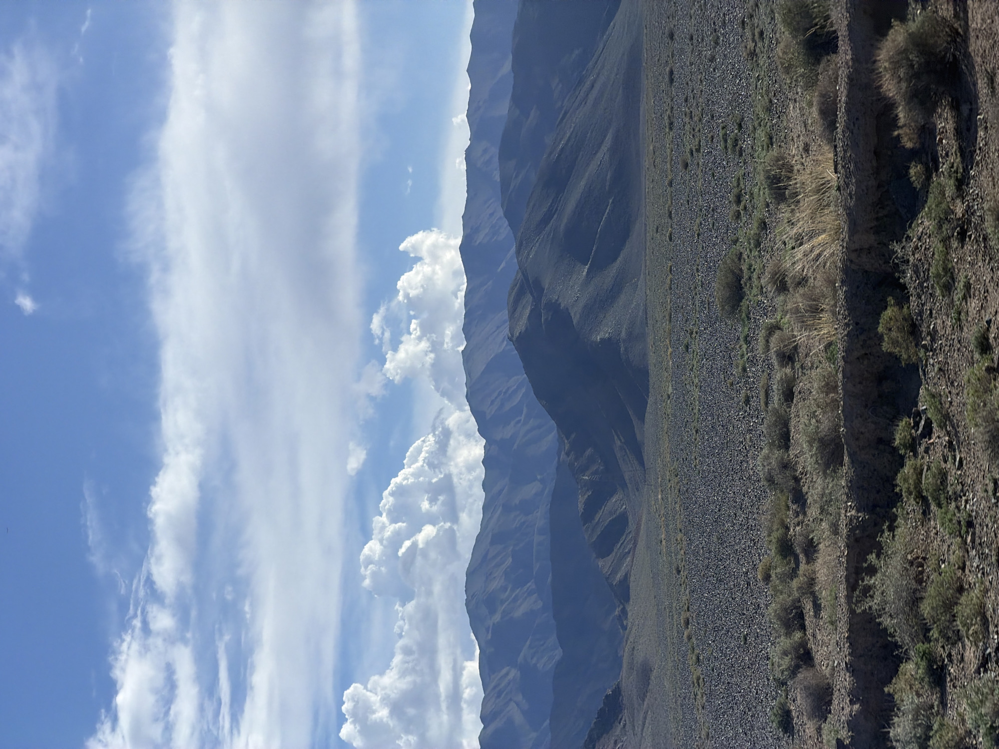 Mountainous landscape captured under cloudy skies in Kyrgyzstan