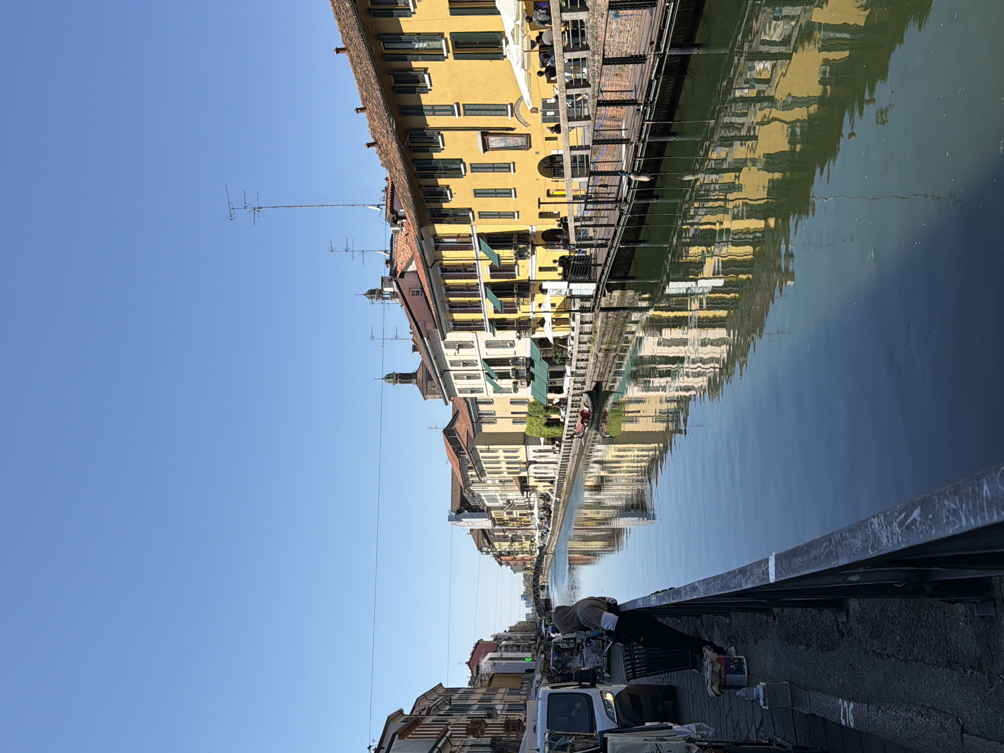 Spring morning scenes captured across Milan's canals and streets