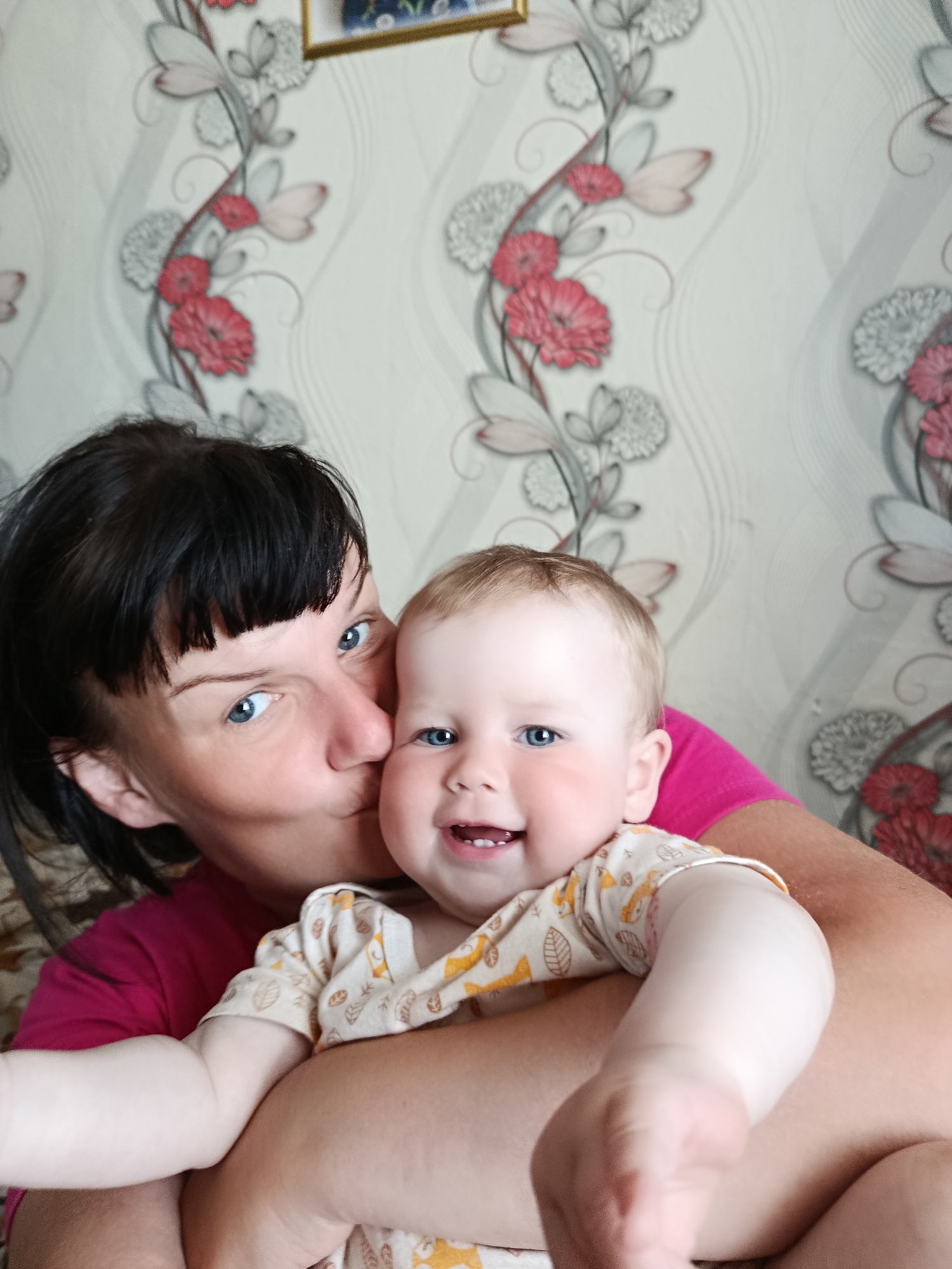 Tender moments: mother-child kiss, gentle water touch captured