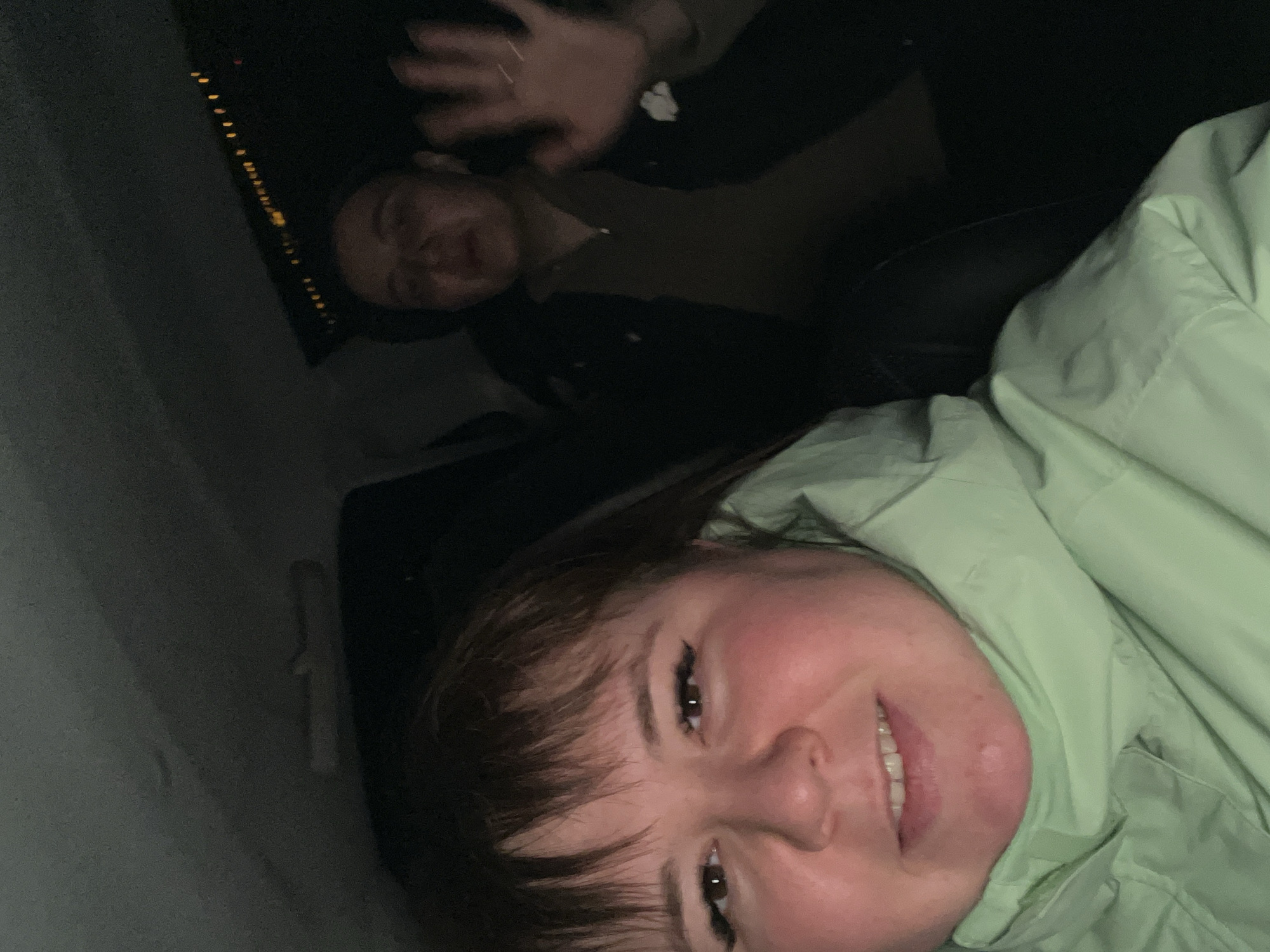 Two people share moment in dimly lit Chaikovsky selfie