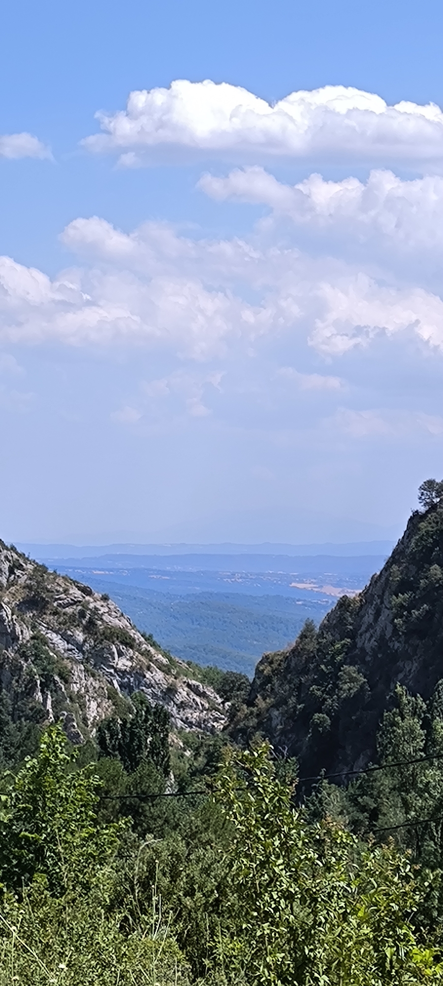 Mountain road stop near Berga with open valley views