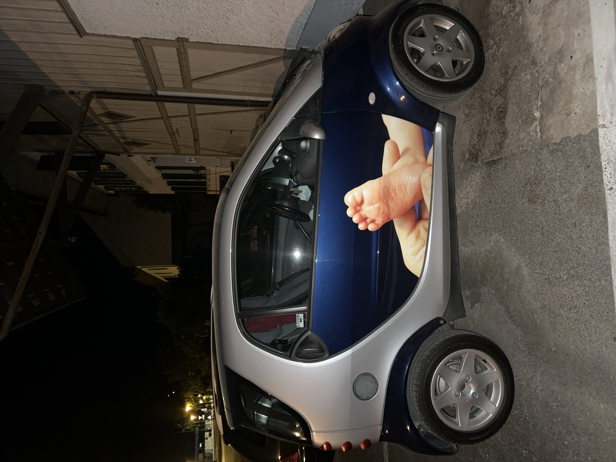 Smart car with foot graphic spotted in Uster, Switzerland