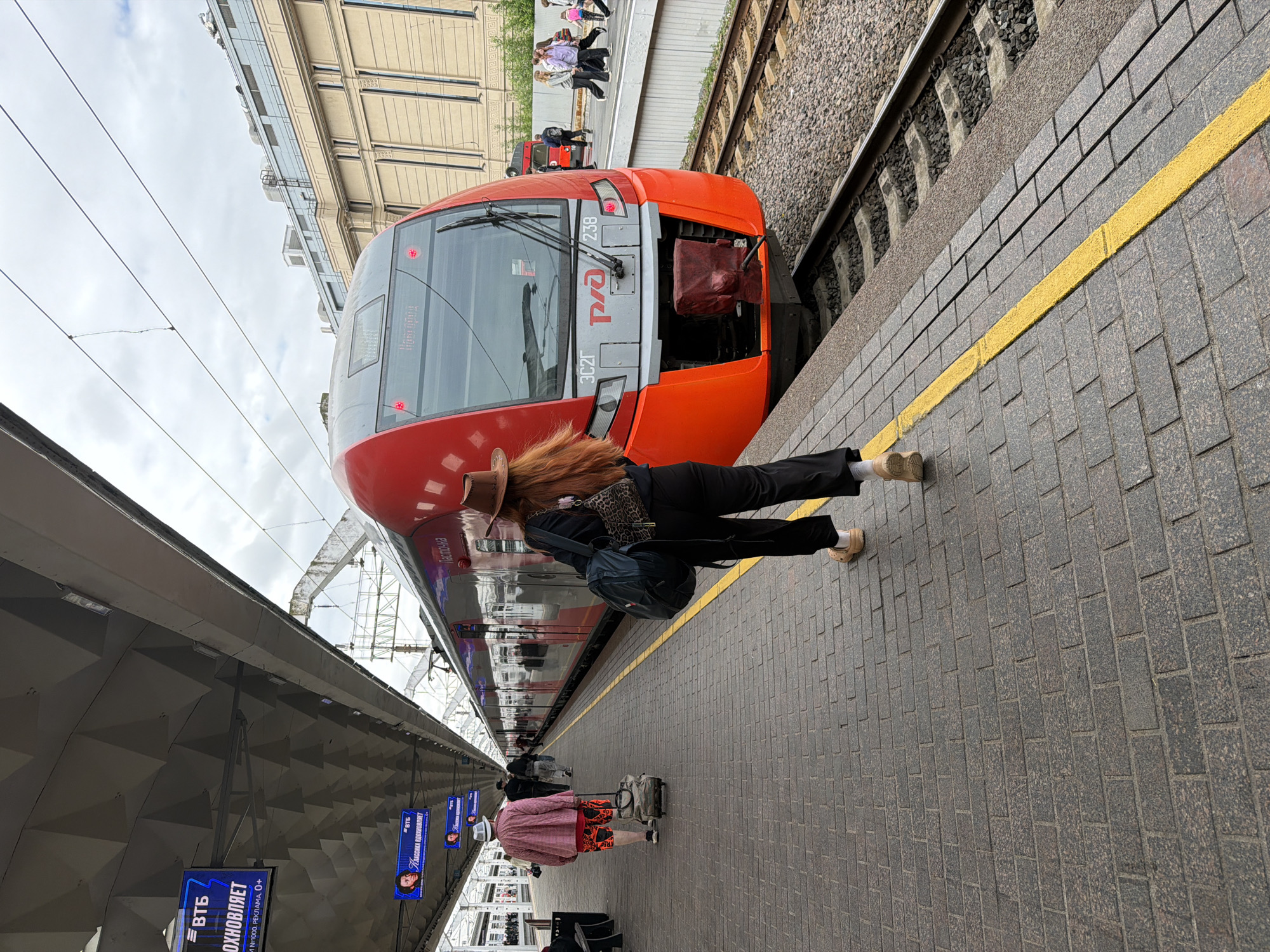 RZD trains at a Saint Petersburg station, June morning