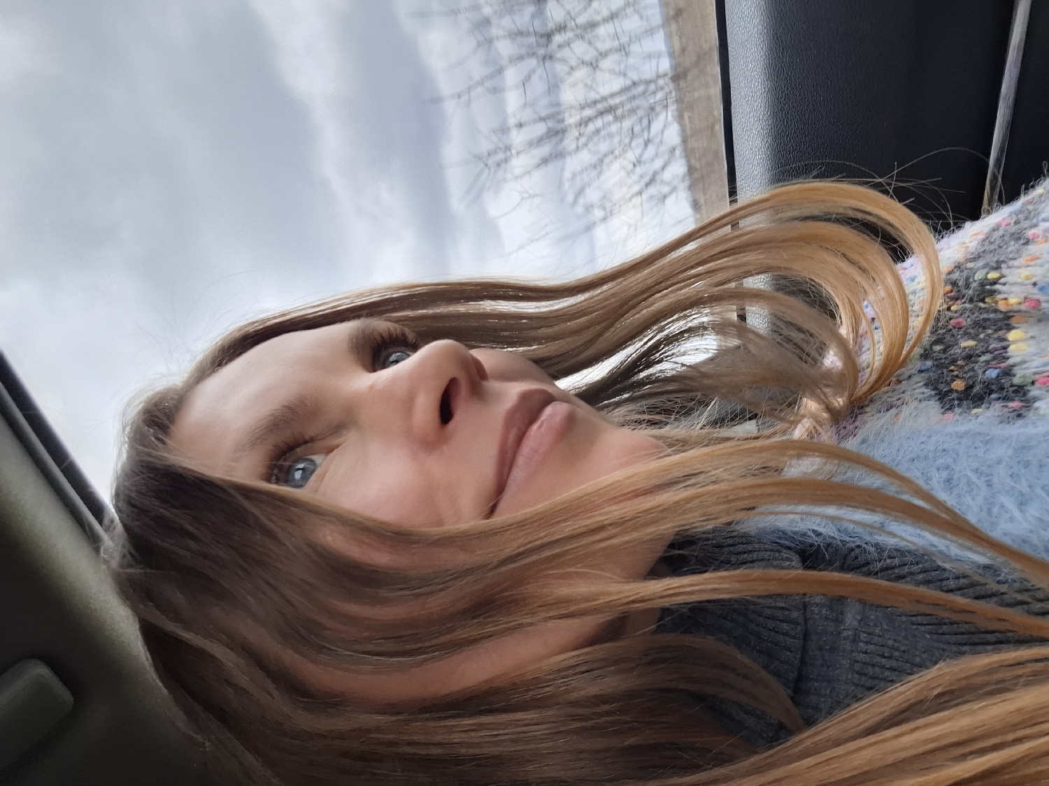 Portrait photographed from vehicle in Алисово, Russia