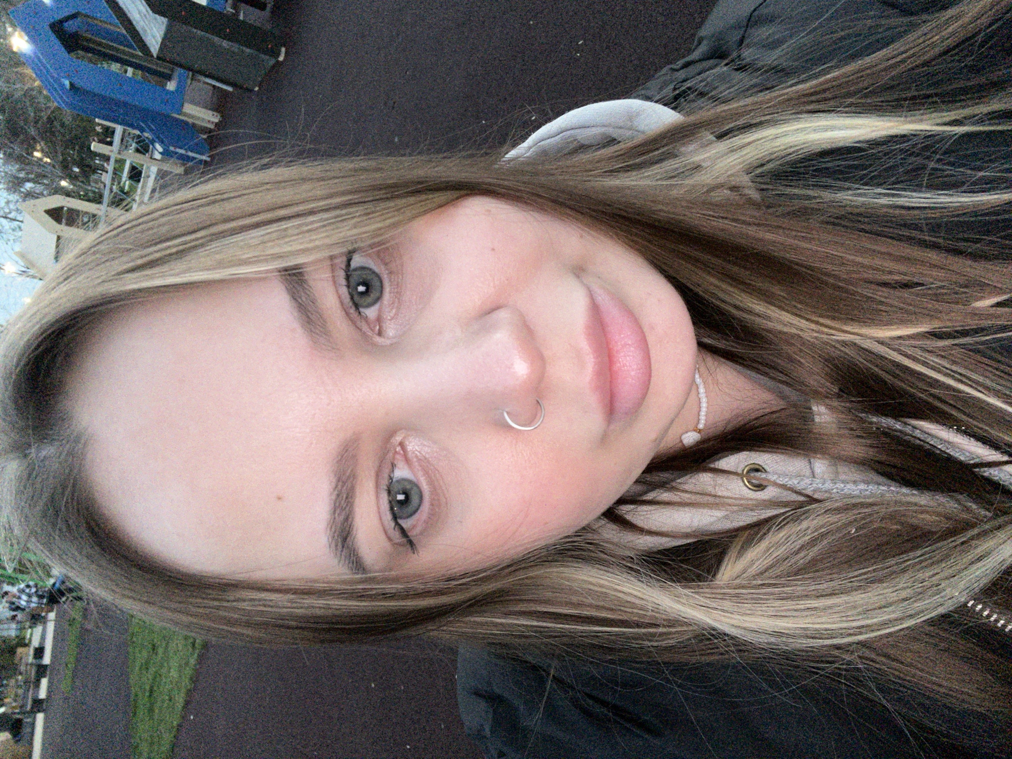 Woman takes selfie in Novopokrovskaya, Russia