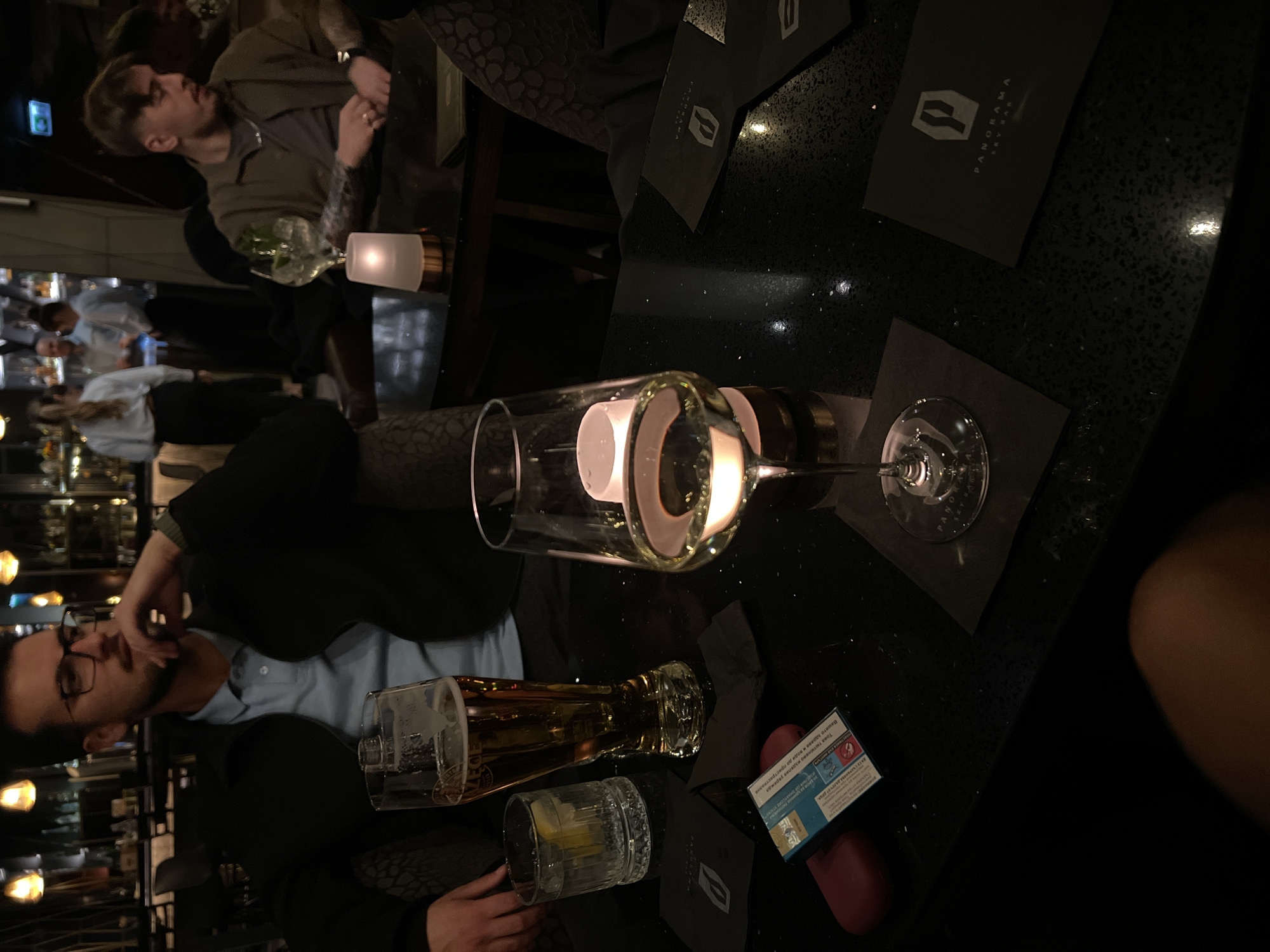 Evening drinks captured at Warsaw bar with city views