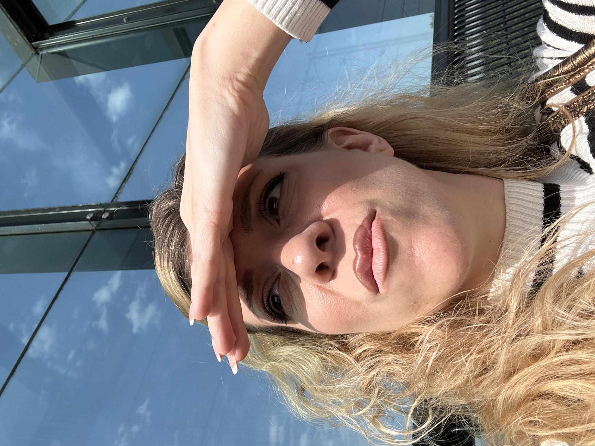 Woman documents afternoon scenes at Dutch train station