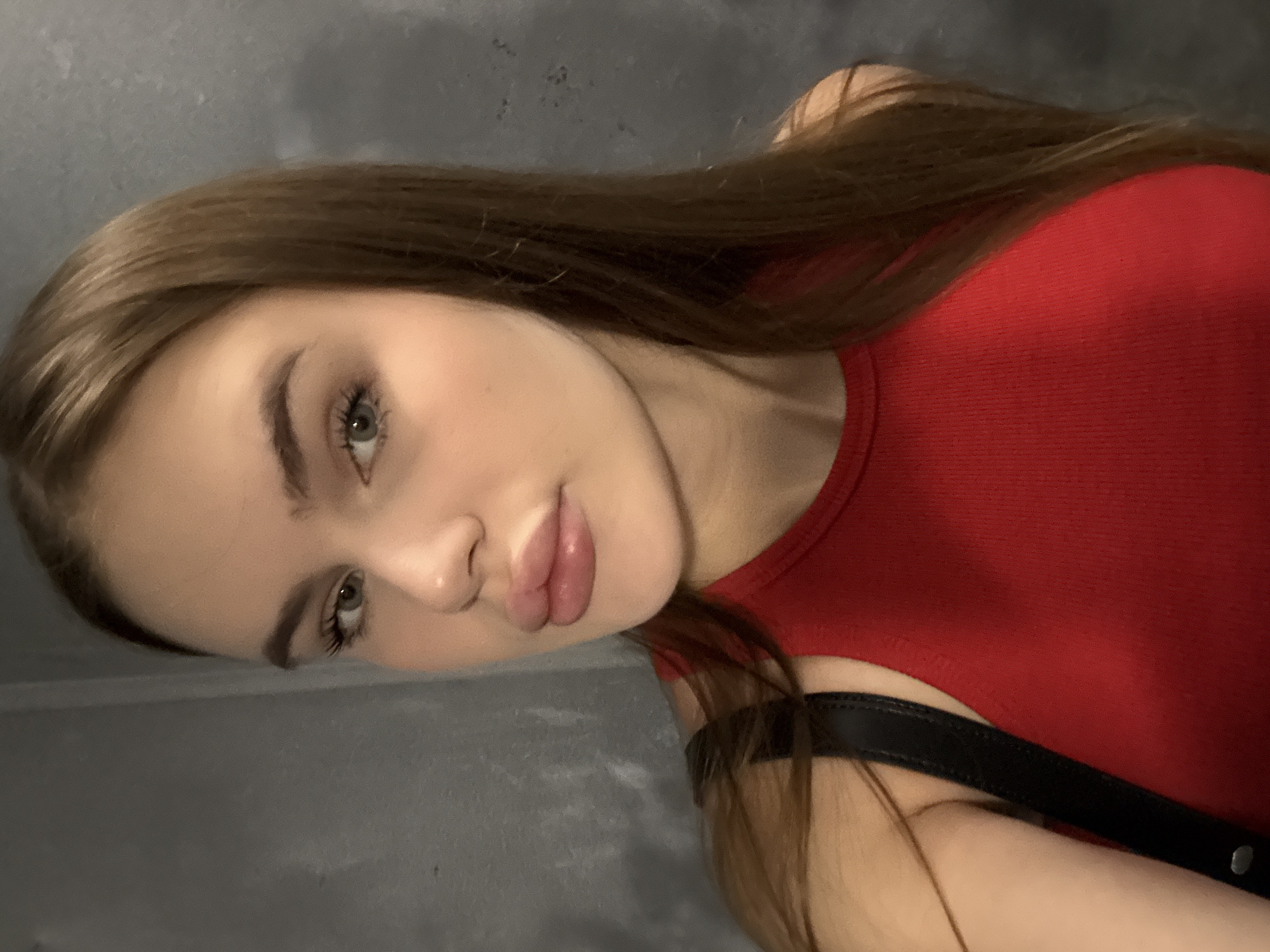 Quick selfie sequence against a concrete wall in Dnipro