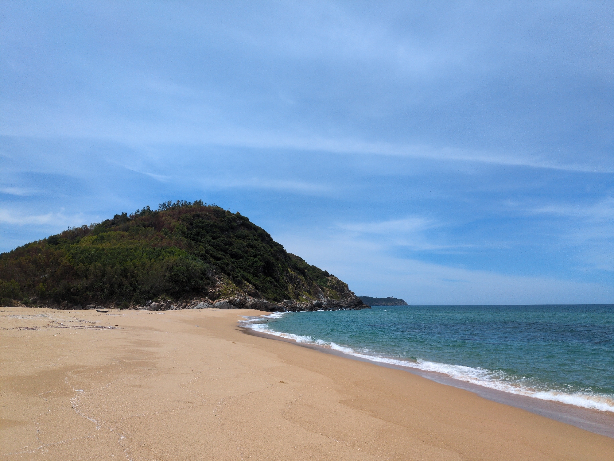 Sa Huynh's quiet coastline on a calm July morning