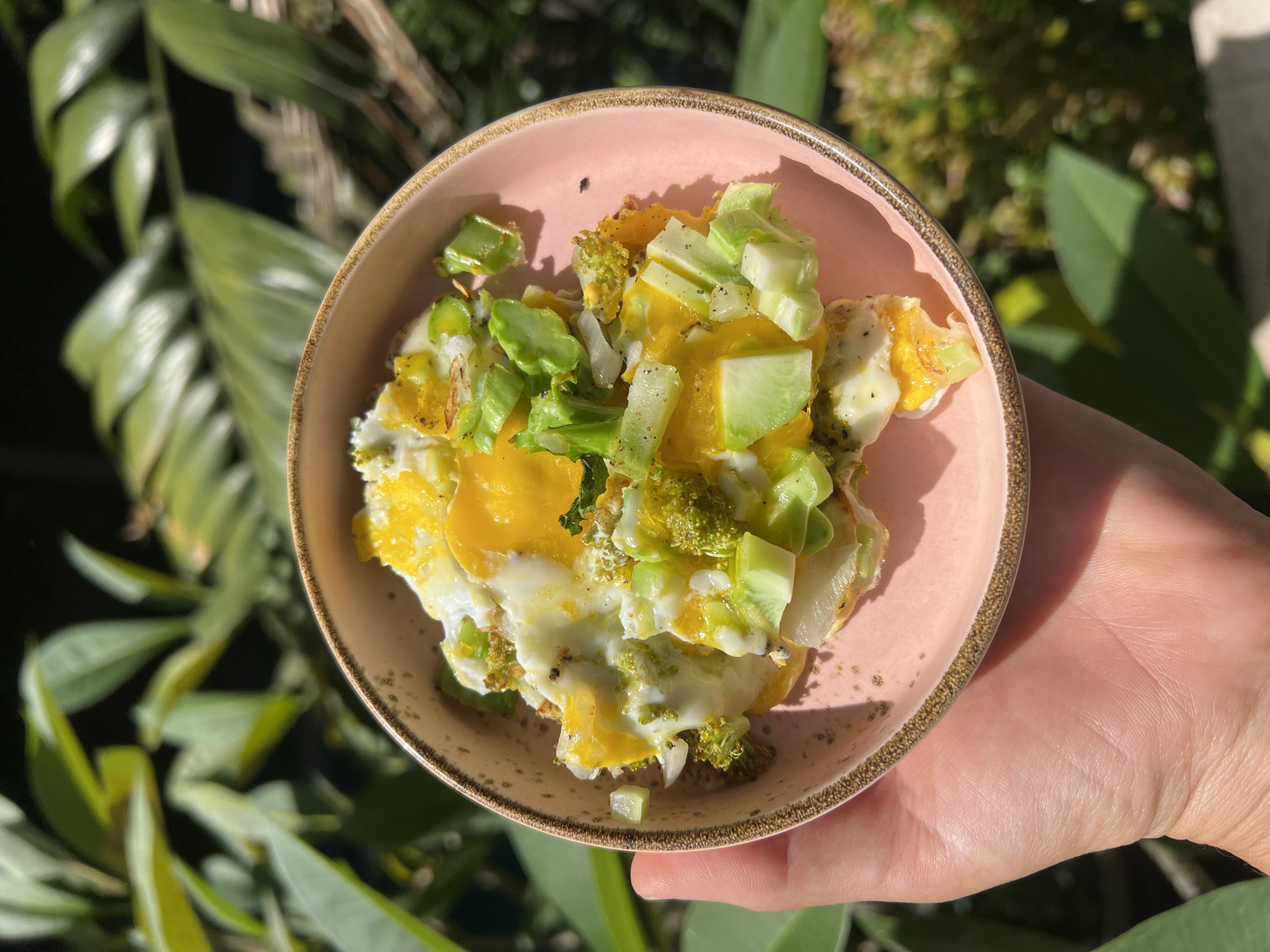 Egg dish with green vegetables served in Ubud, Indonesia