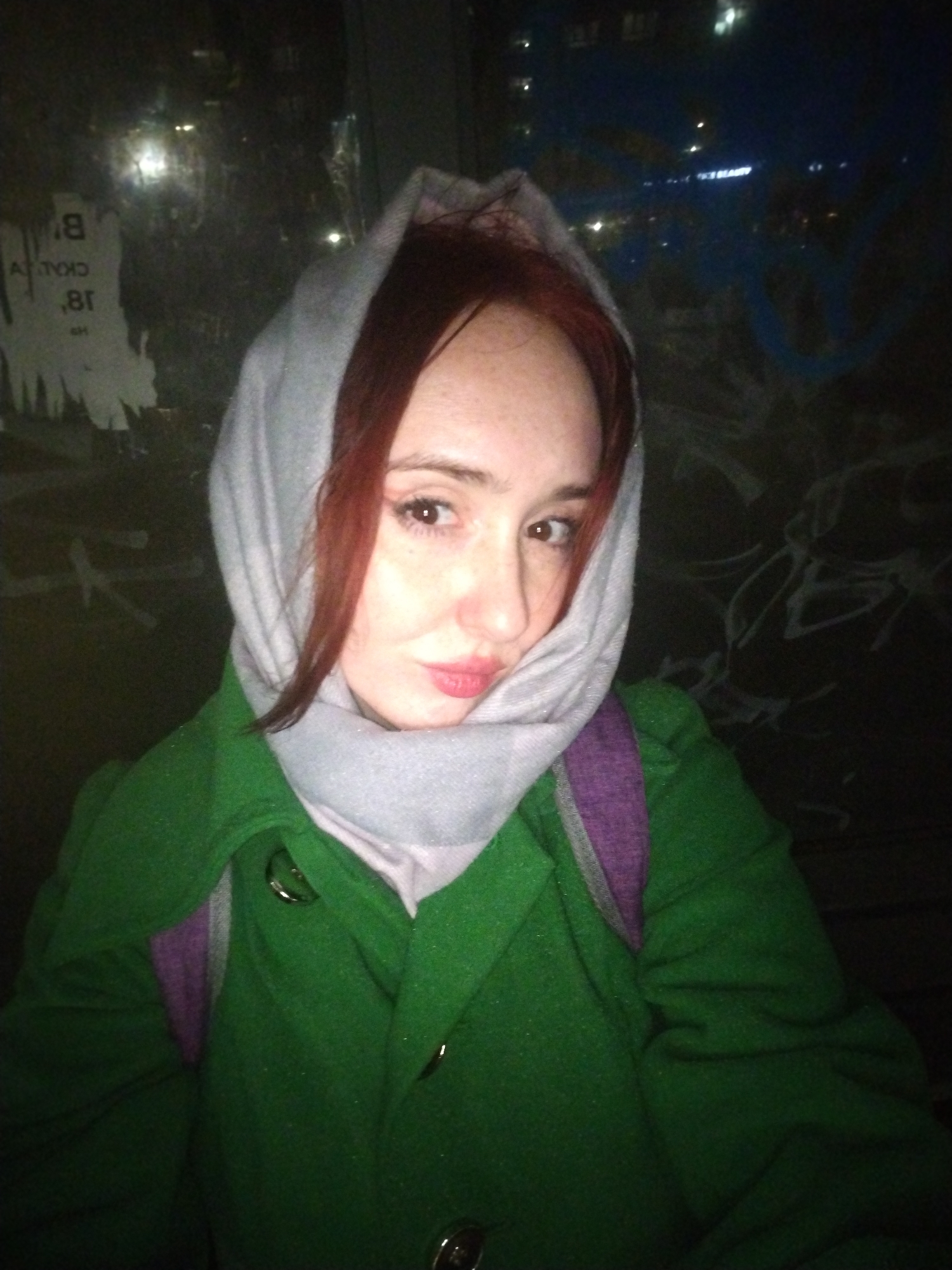 Nighttime street photography captured rainy evening in Izhevsk, Russia