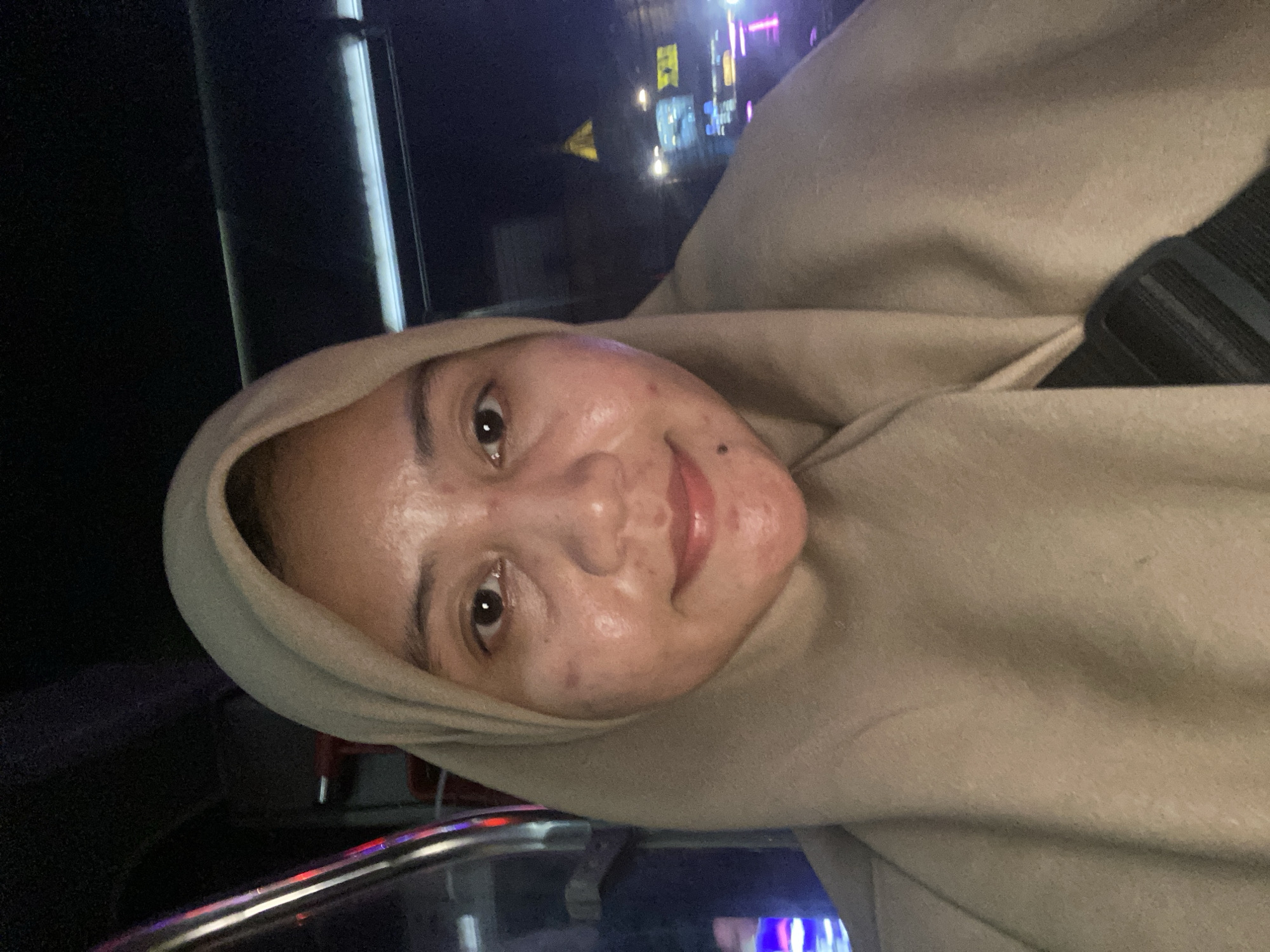 On a Banjarmasin city bus heading toward RSUD Ulin at night