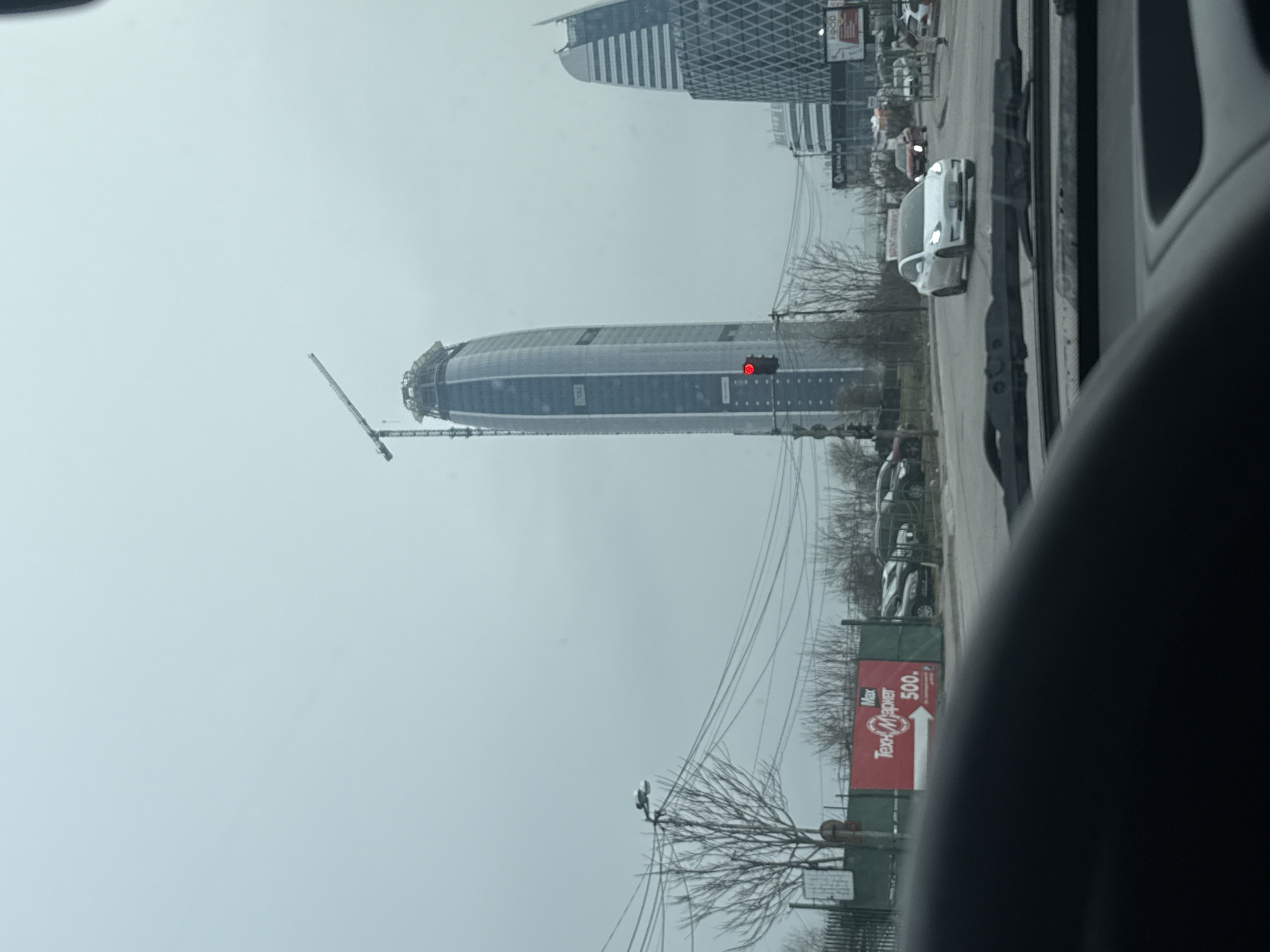 Capital Fort skyscraper construction viewed from vehicle in Sofia