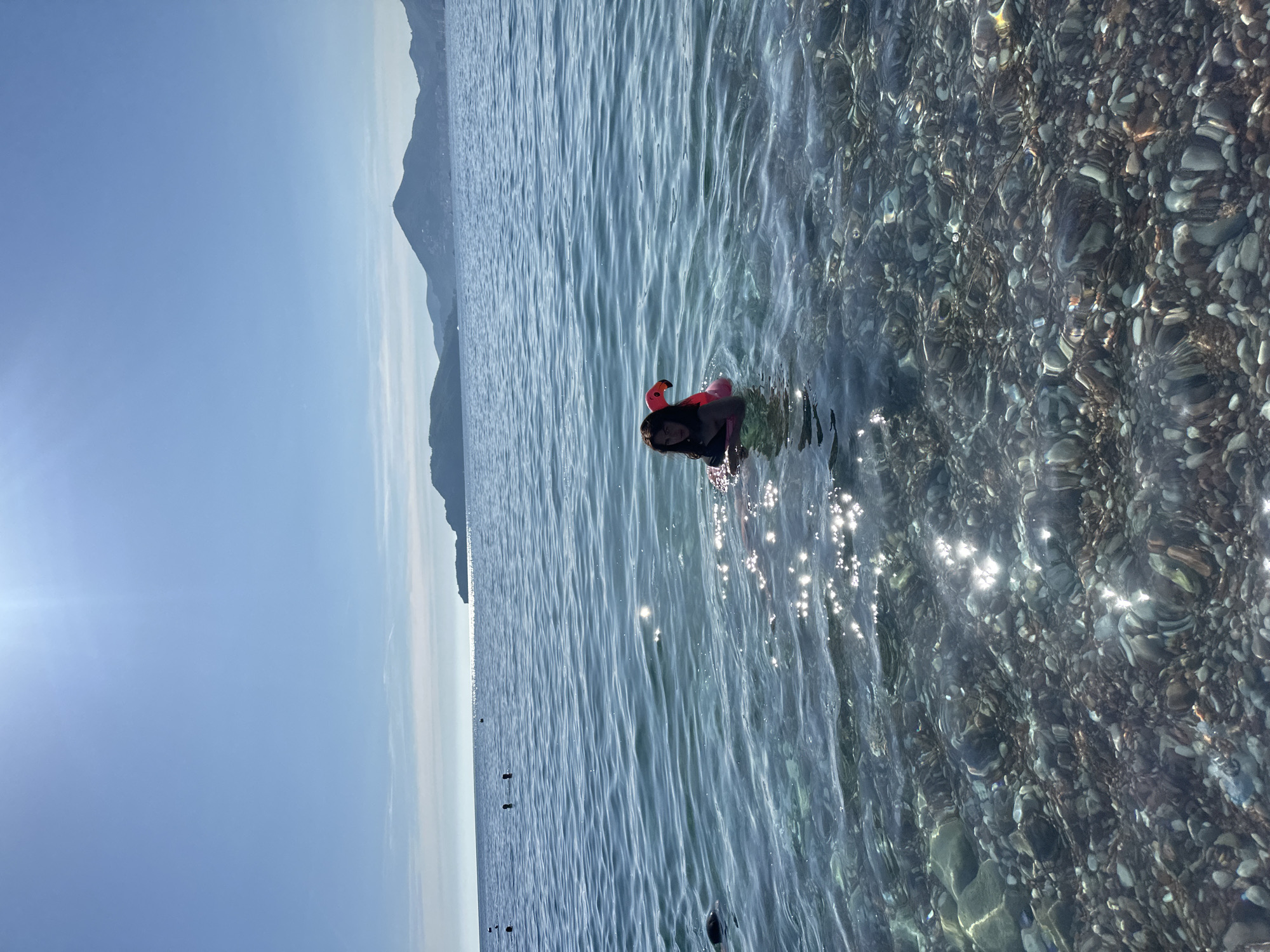 Summer beach day draws visitors to Montenegro's Sveti Stefan