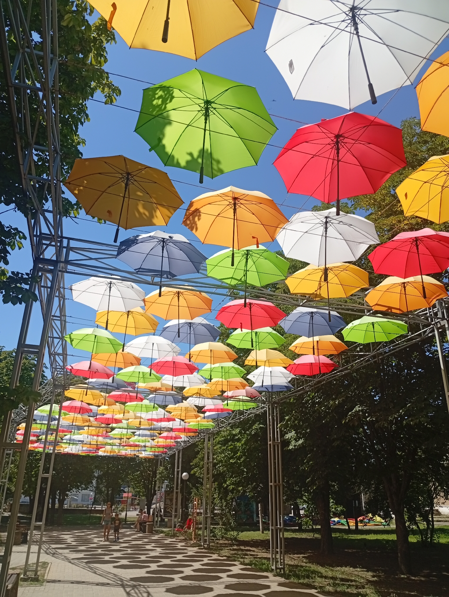 Pokrov park in full summer bloom, umbrellas and all