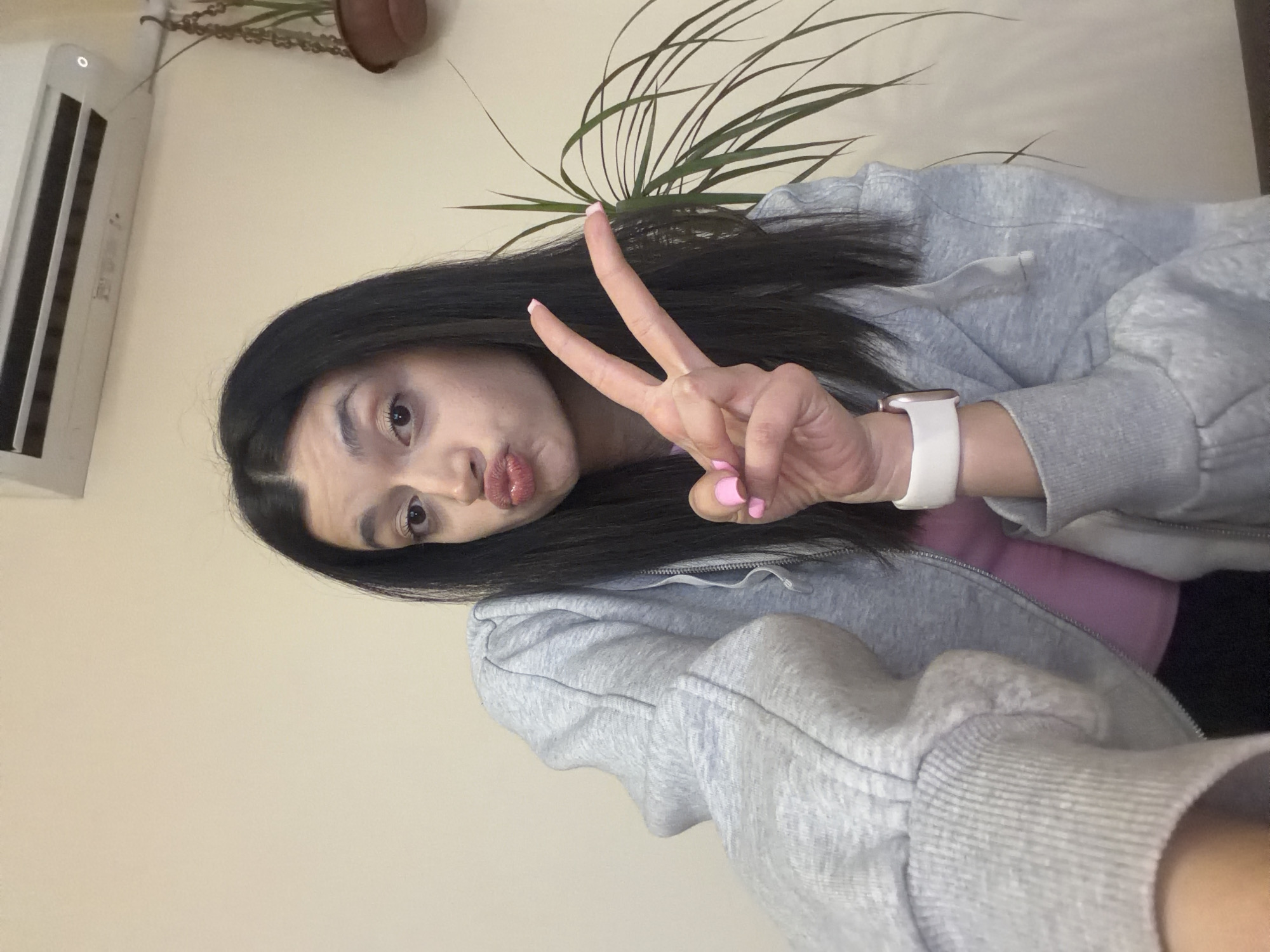 Woman takes peace sign selfie in Pazardzhik