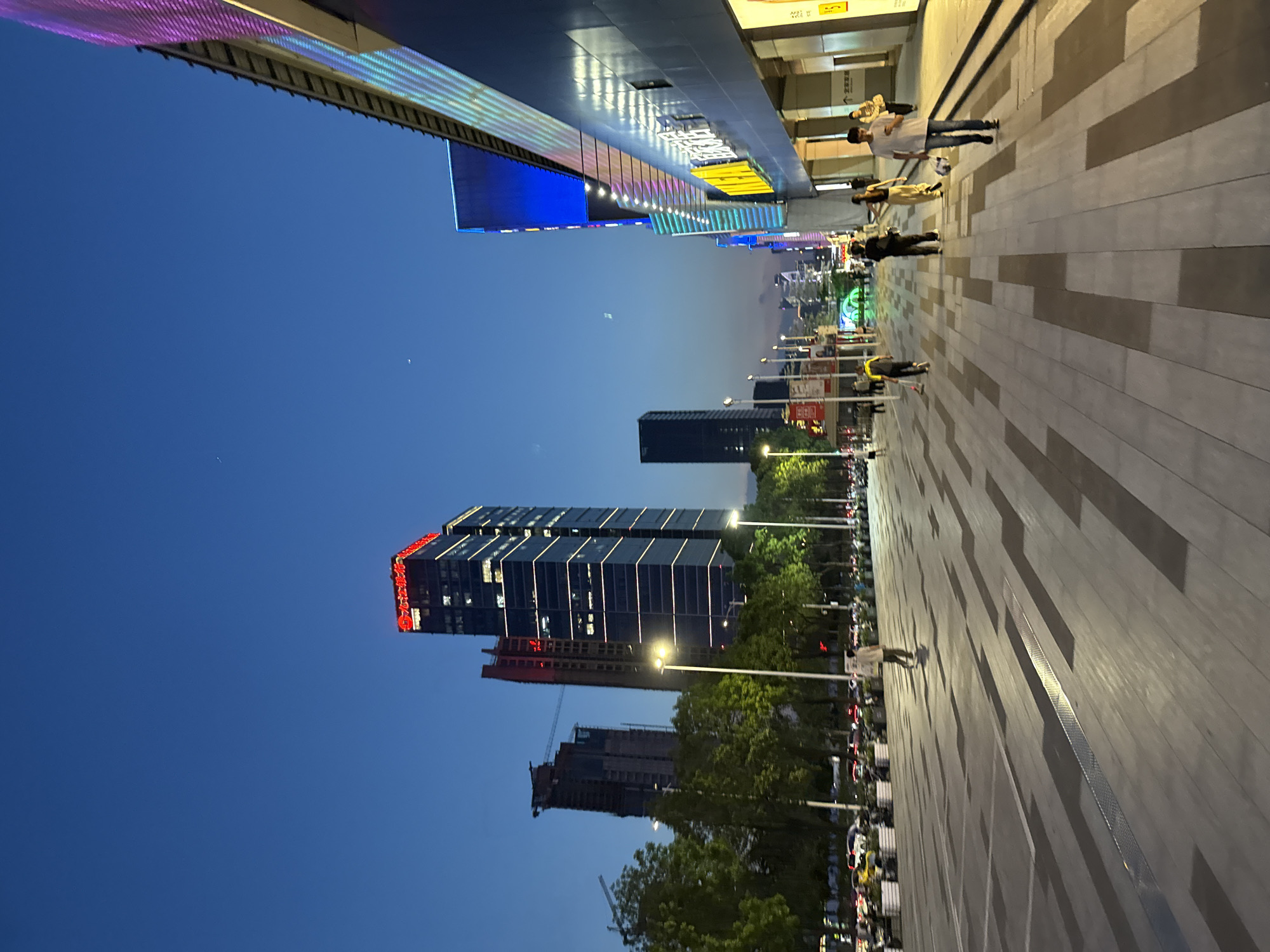 Evening walk documented through illuminated Tianhe District, Guangzhou