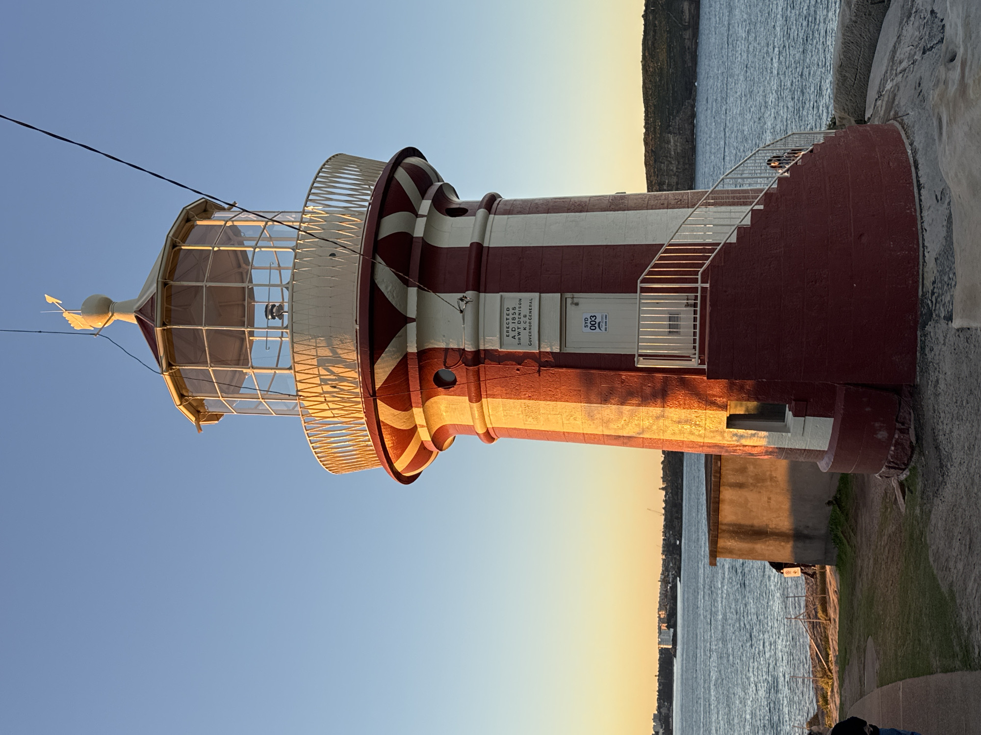 Sydney's southern coastline at sunrise, lighthouse to rocky shore