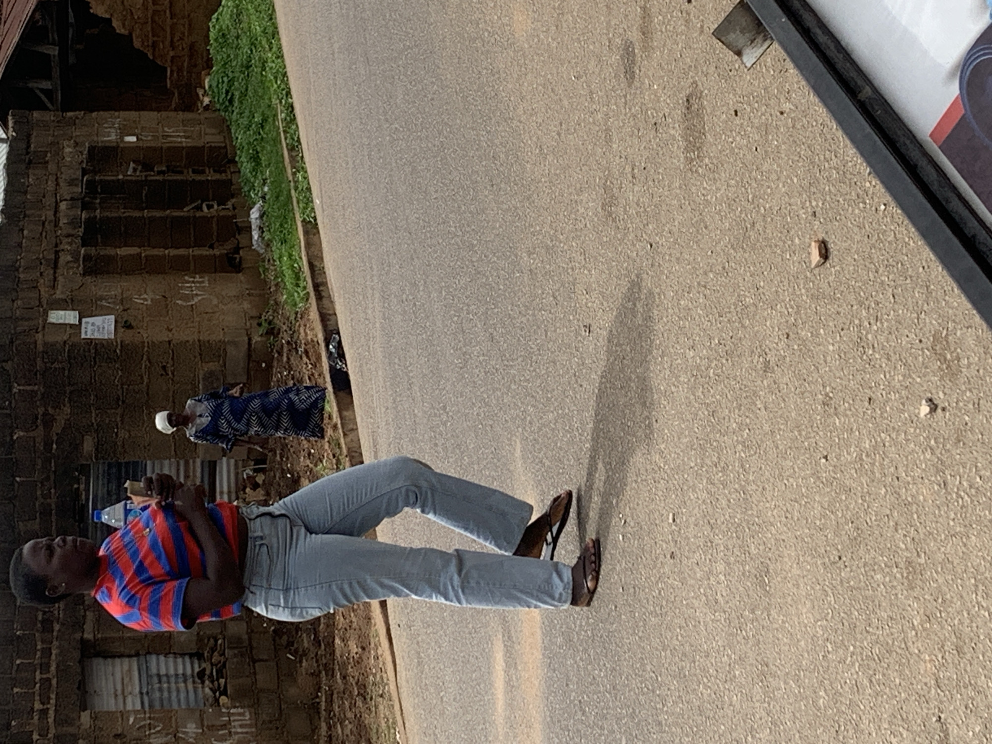 Daily life scenes across Jos, Nigeria streets and buildings