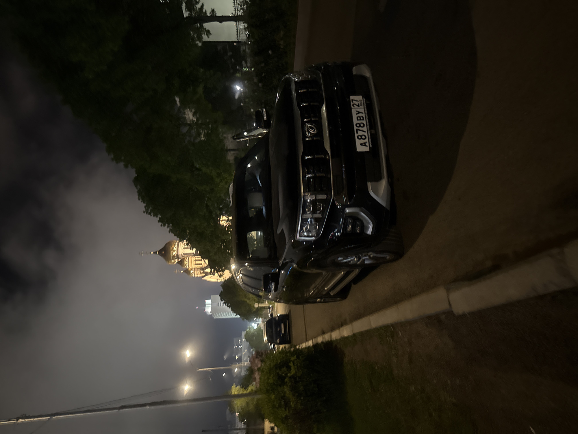 Nighttime scenes captured across Vladivostok harbor and streets
