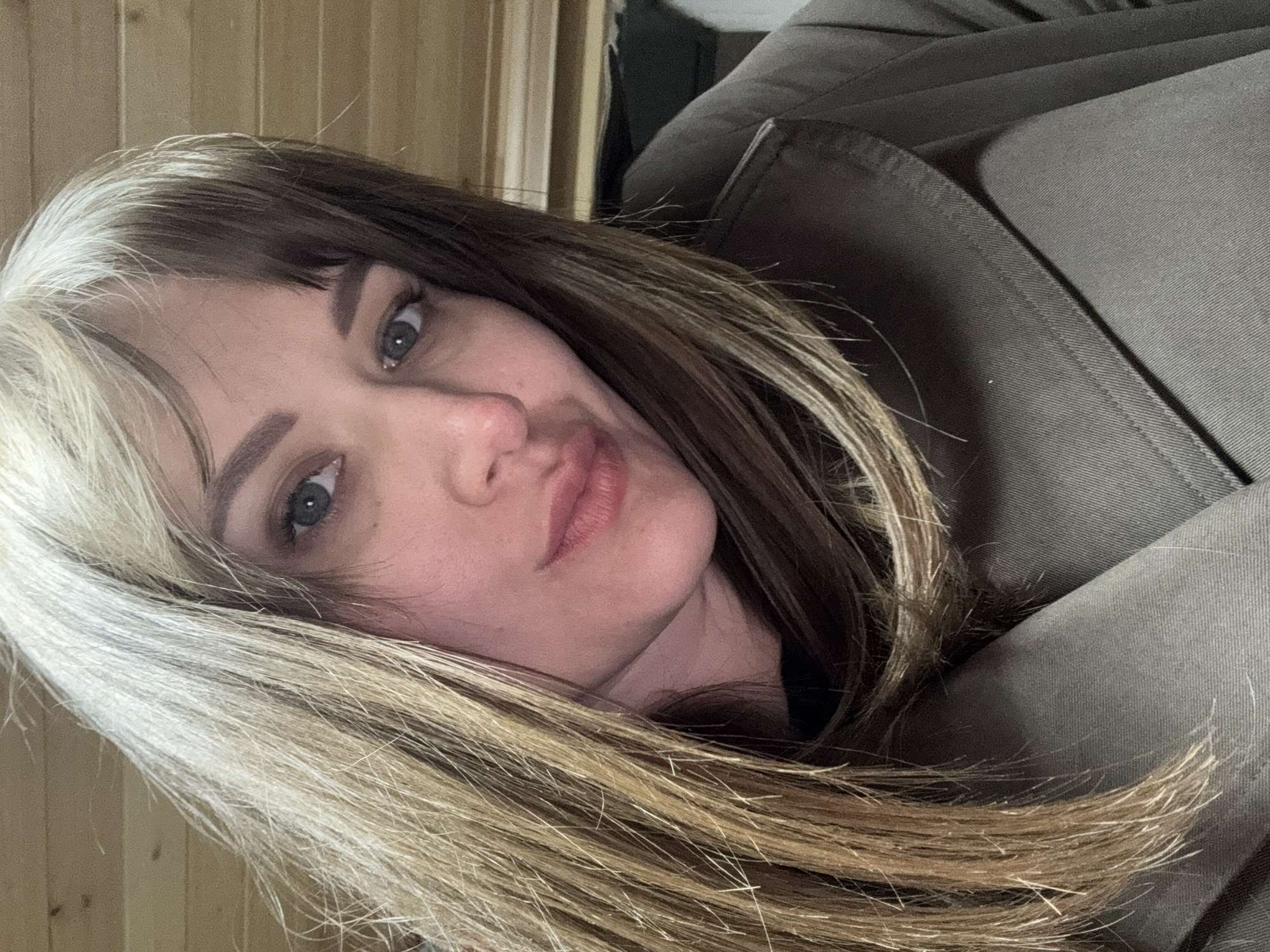 Woman takes selfie in residential Chaikovsky, Russia