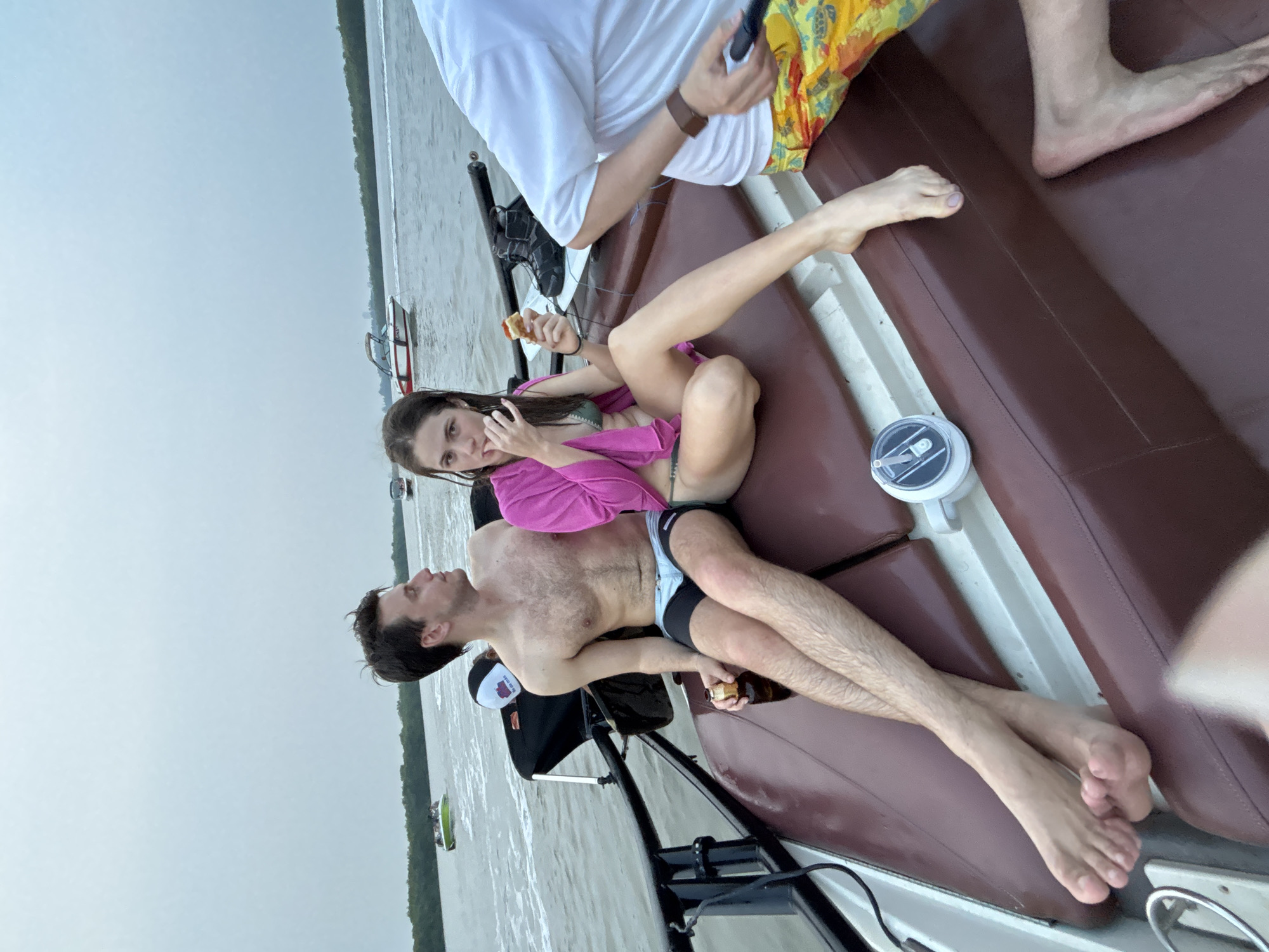 Multiple boats gather for nighttime water party