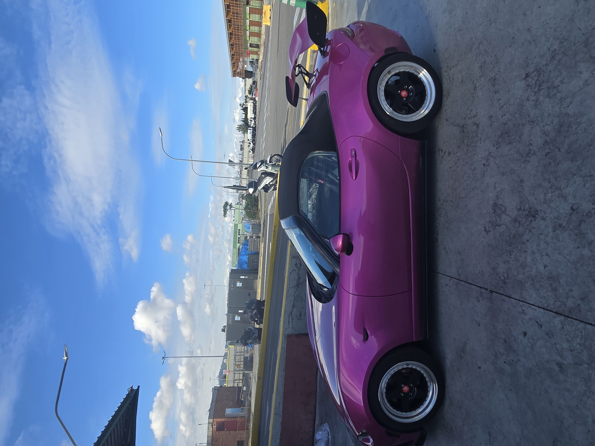 Pink convertible sports car spotted parked in Barcelona