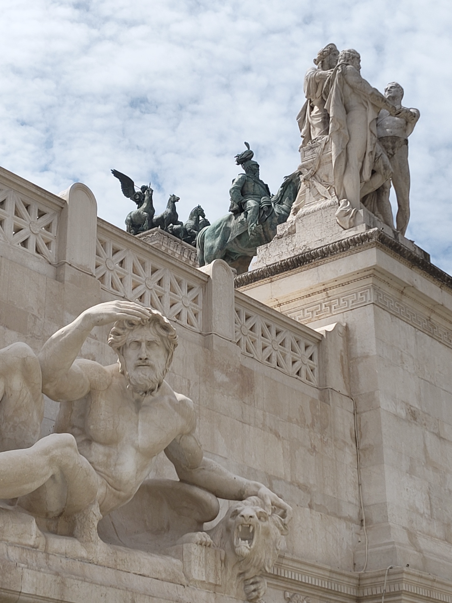 Tourist documents Rome's historic monuments during morning visit