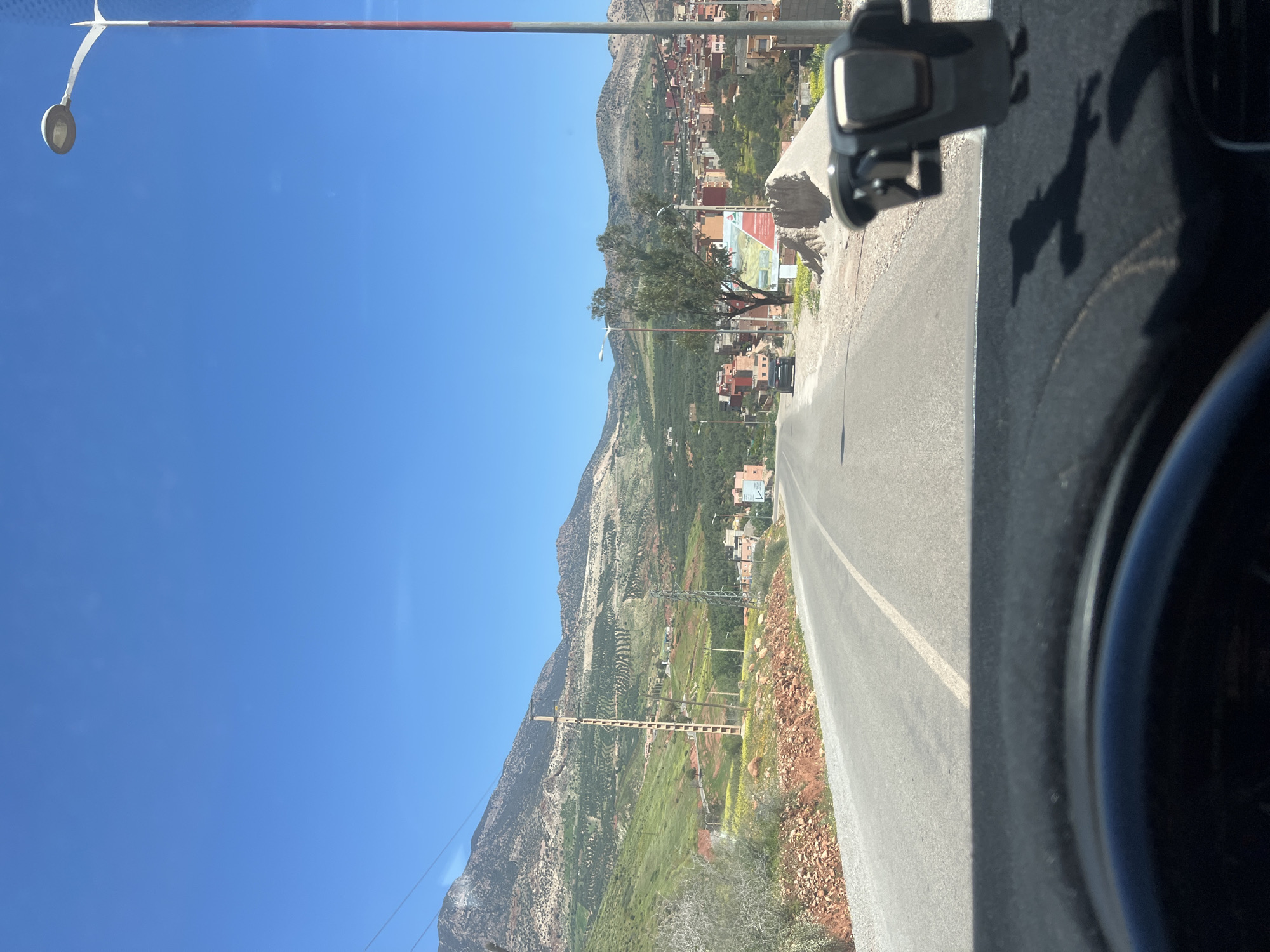 Vehicle journey through Ouaouizert Morocco captures street scenes