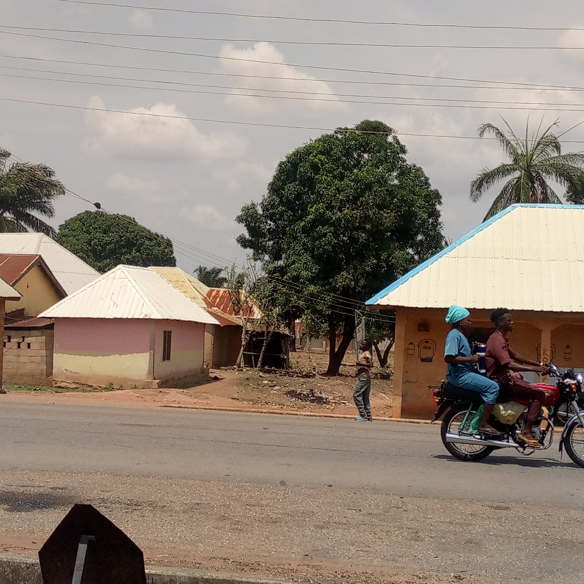 Daily street life documented in unspecified urban area