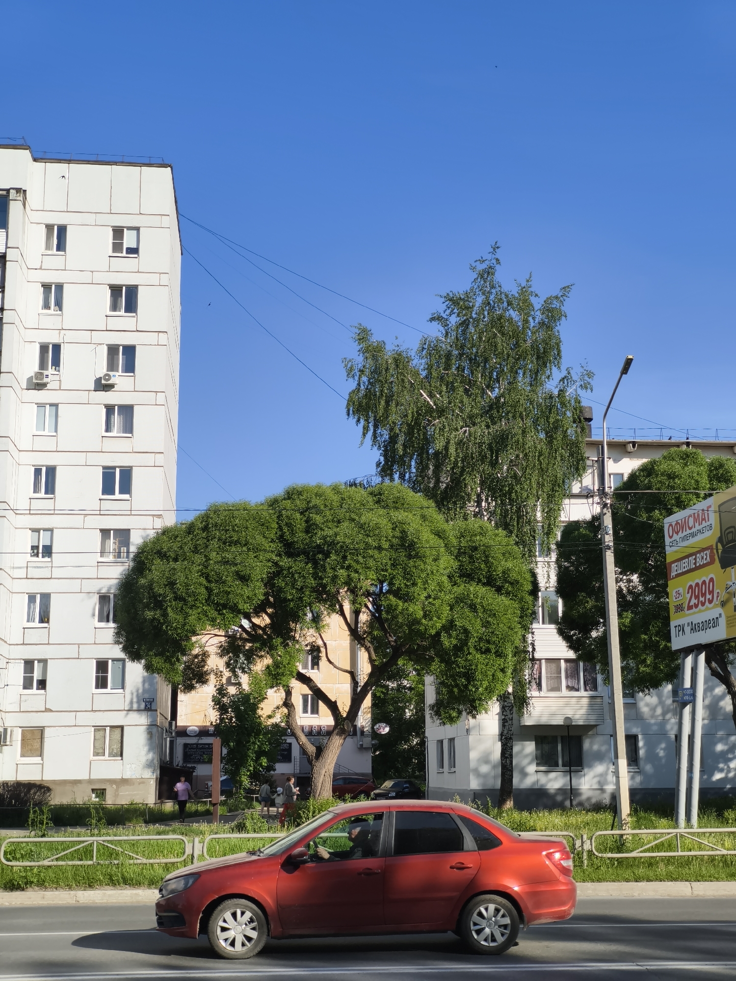 Ordinary sunny day documented across Chaikovsky, Russia streets