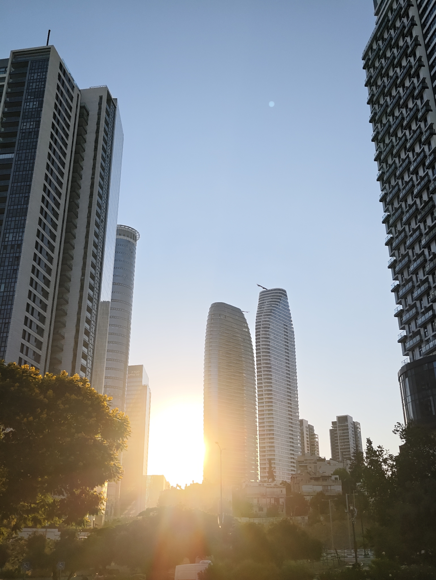 Tel Aviv–Givatayim skyline at golden hour, flag included