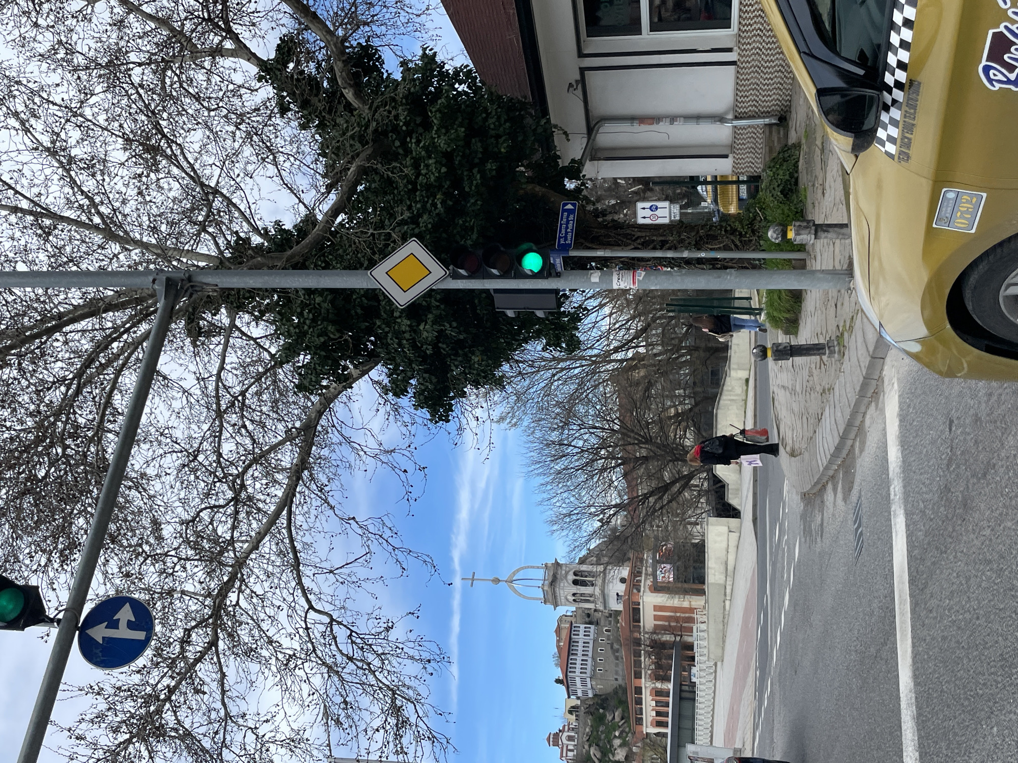 Green traffic light observed with road signs in Plovdiv