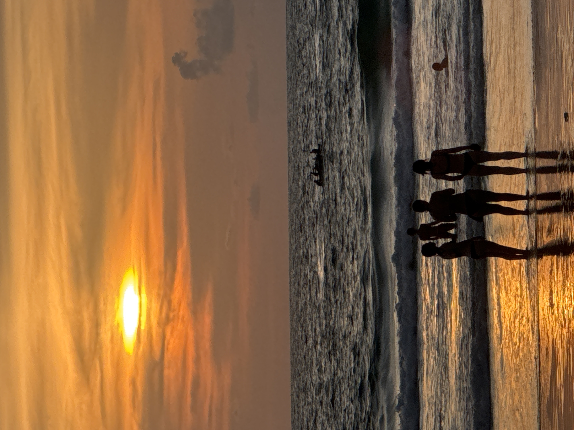 Karon Beach crowd soaks in a warm Andaman sunset