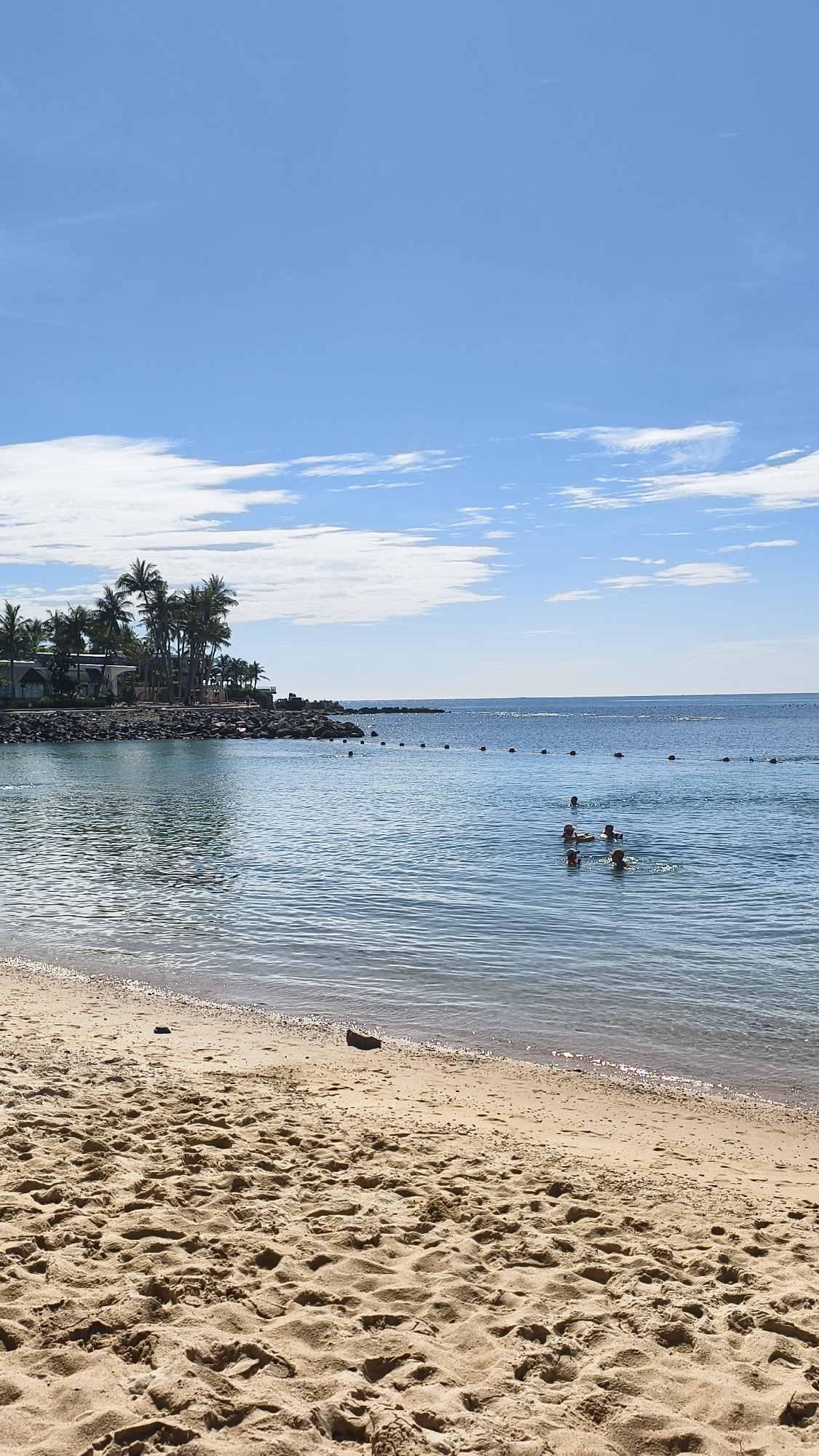 Nha Trang beachfront mid-construction, resort life still in full swing
