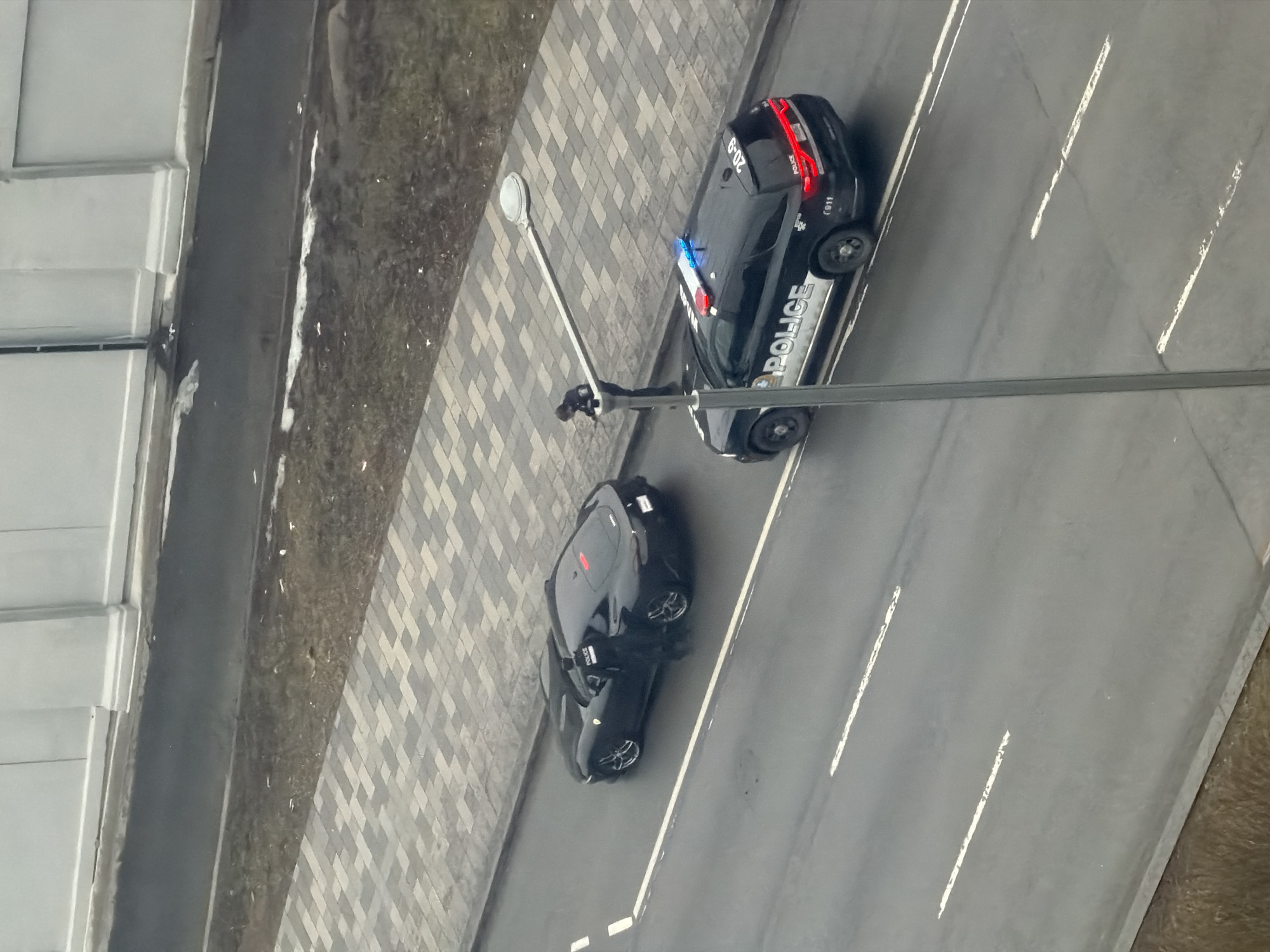 Police conduct traffic stop of sports car in Montreal
