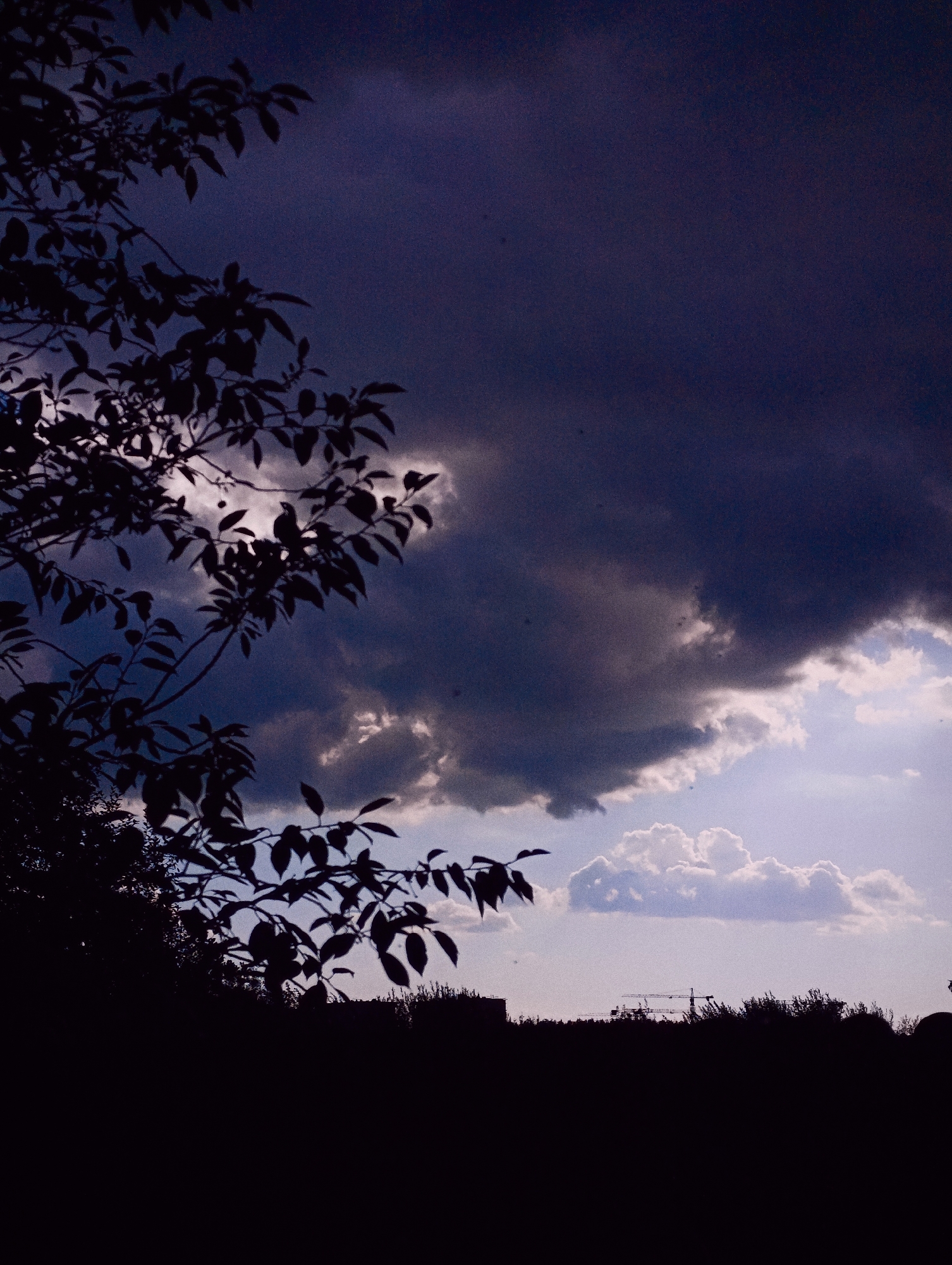 Storm clouds gather, sunlight breaks through in dramatic sky series
