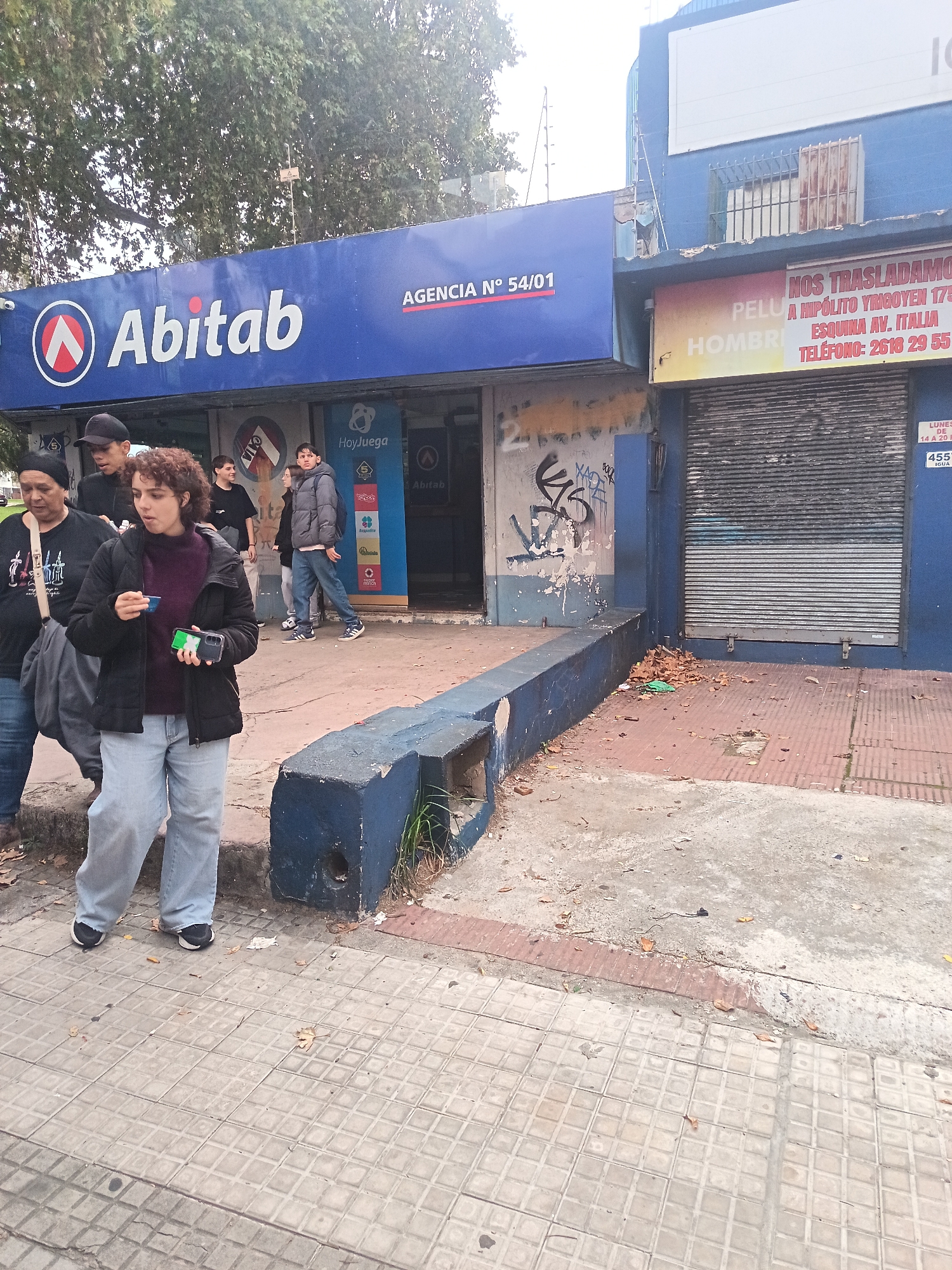 Montevideo street scenes documented: Abitab branch, residential buildings
