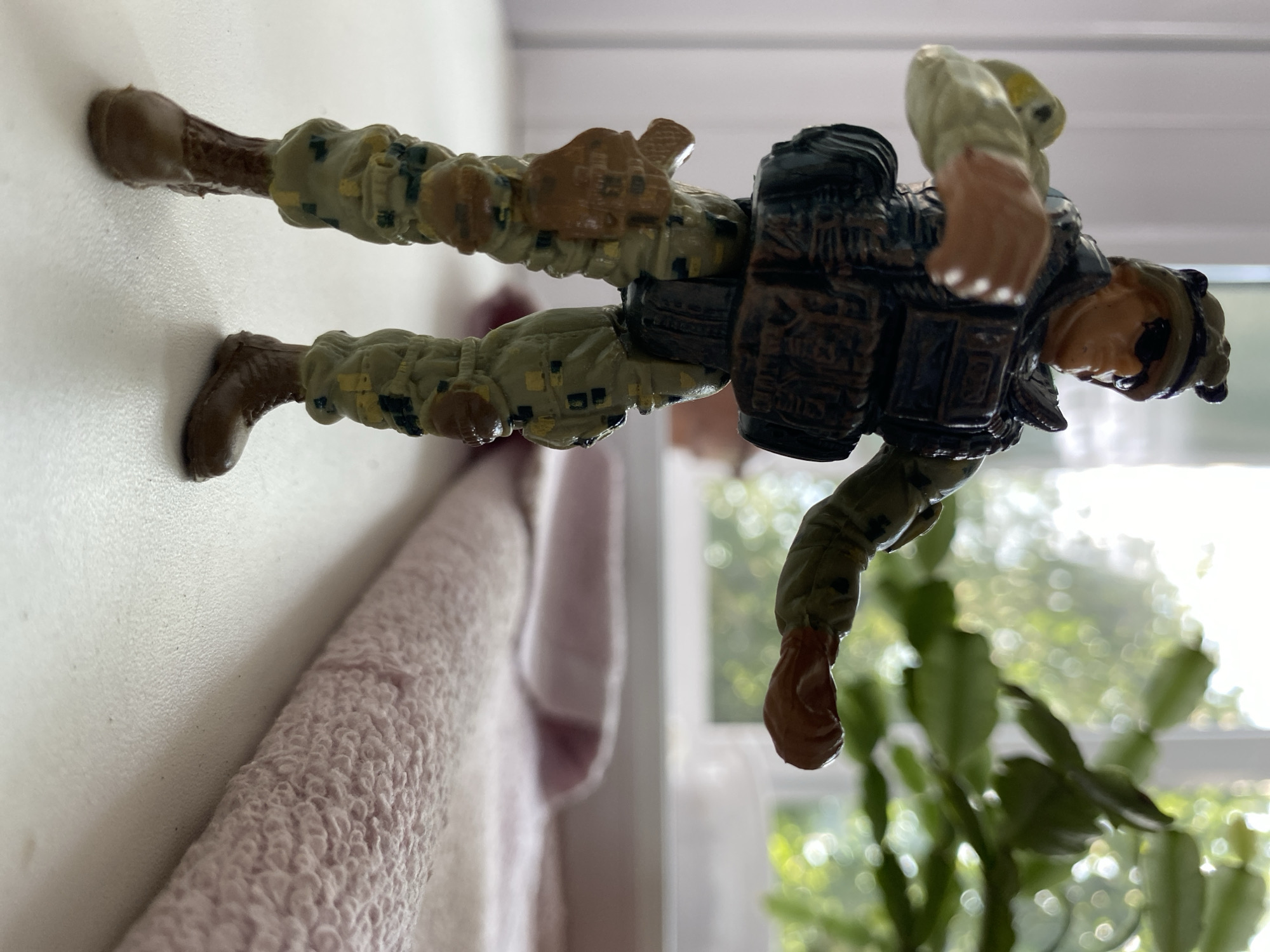 Toys, accessories, and home items photographed in a Kazakhstan household