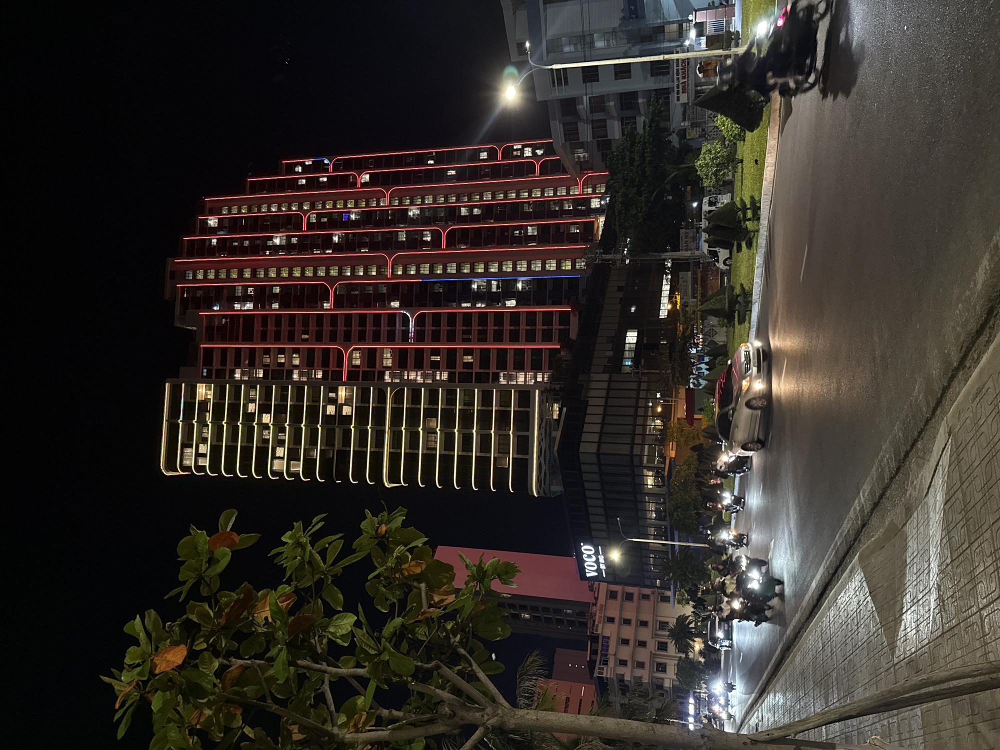 Nha Trang night: glowing architecture, outdoor exercise, and sleepy cats