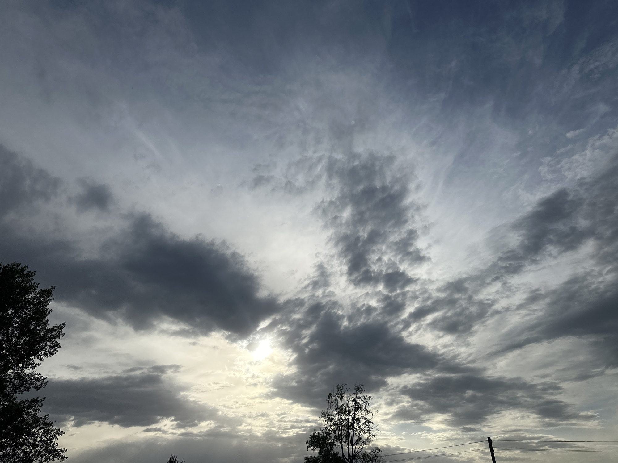 Mixed cloud formations observed over Chaikovsky, Russia